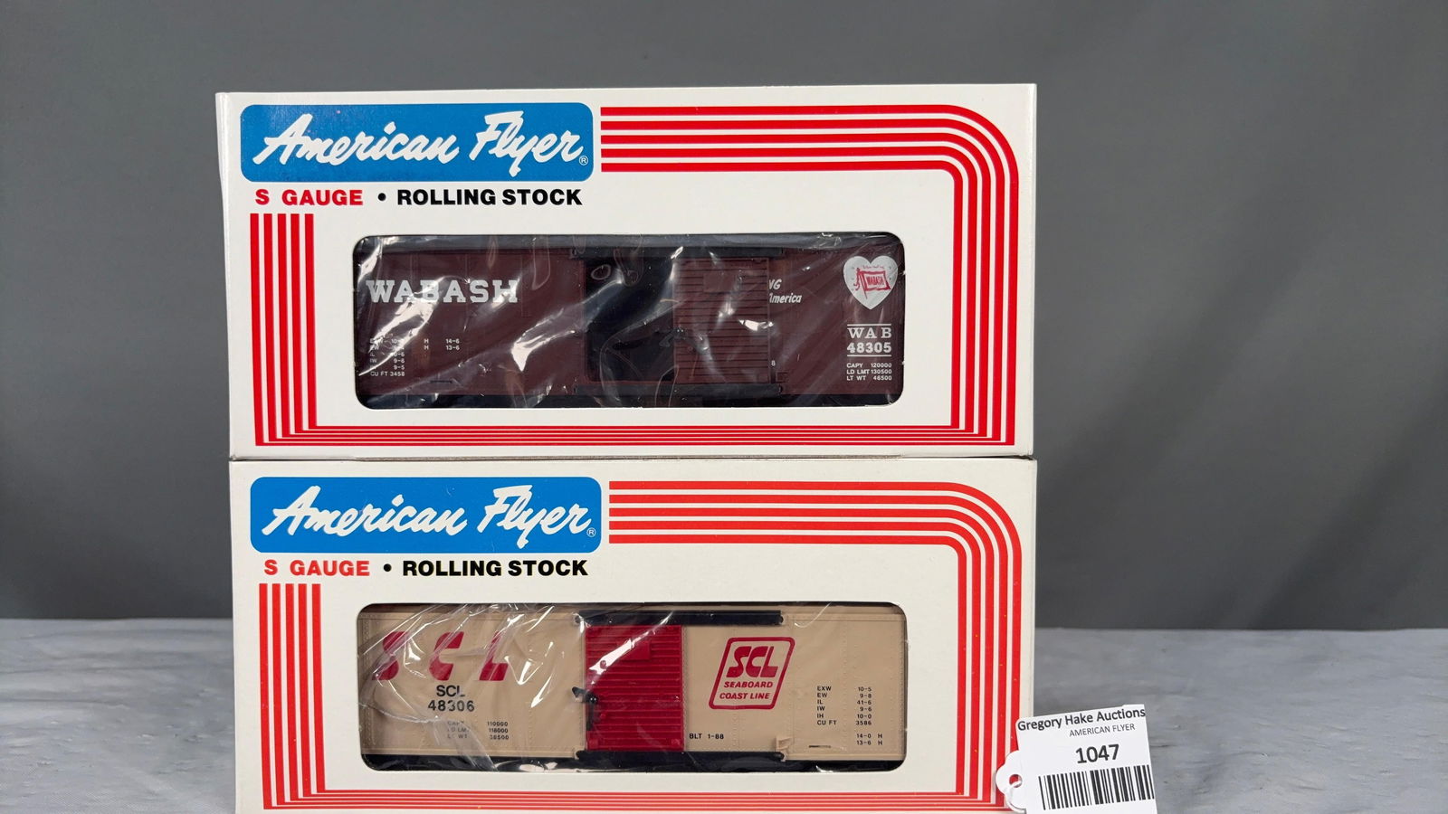 American Flyer 48305 Wabash and 48306 Seaboard Boxcars w/obs: American Flyer 48305 Wabash and 48306 Seaboard Boxcars w/obs. C9 See photos for details.Size11x5x5