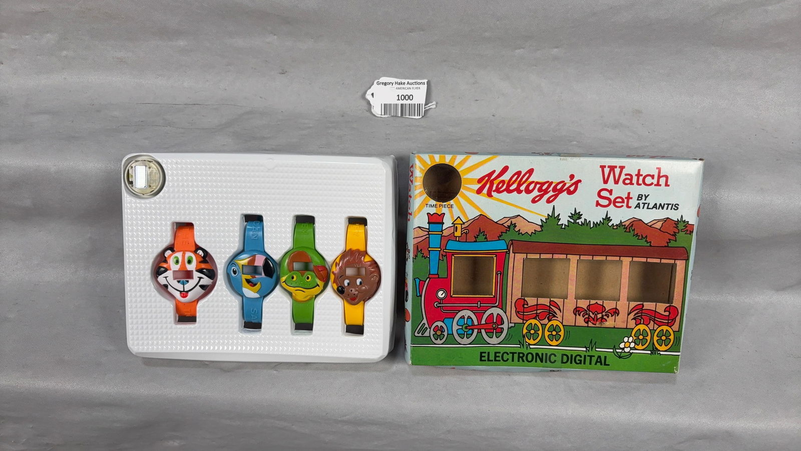 Kellogg's Watch Set by Atlantis: Set of 4 Digital Children's Watch Faces: Tony the Tiger, Toucan Sam, Dig'em the Frog and Poppy Porcupine. Includes Digital Watch. C9.Size8x6x1
