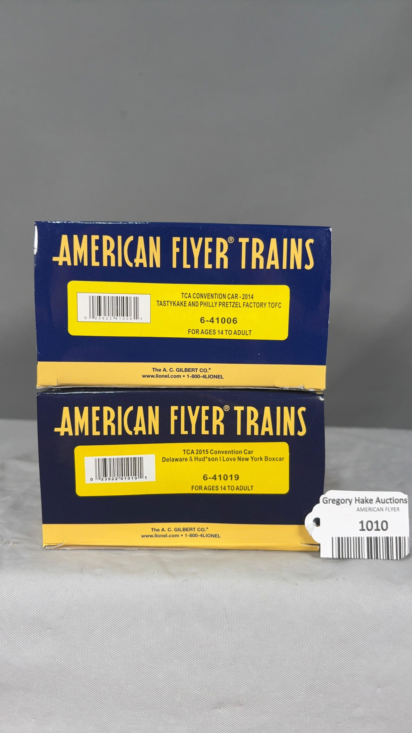 Lot of 2 Am Flyer Freight Cars:6-41006 Tasty Kake Flat Car w/Trailers and 6-41019 I Love NY w/obs - 2