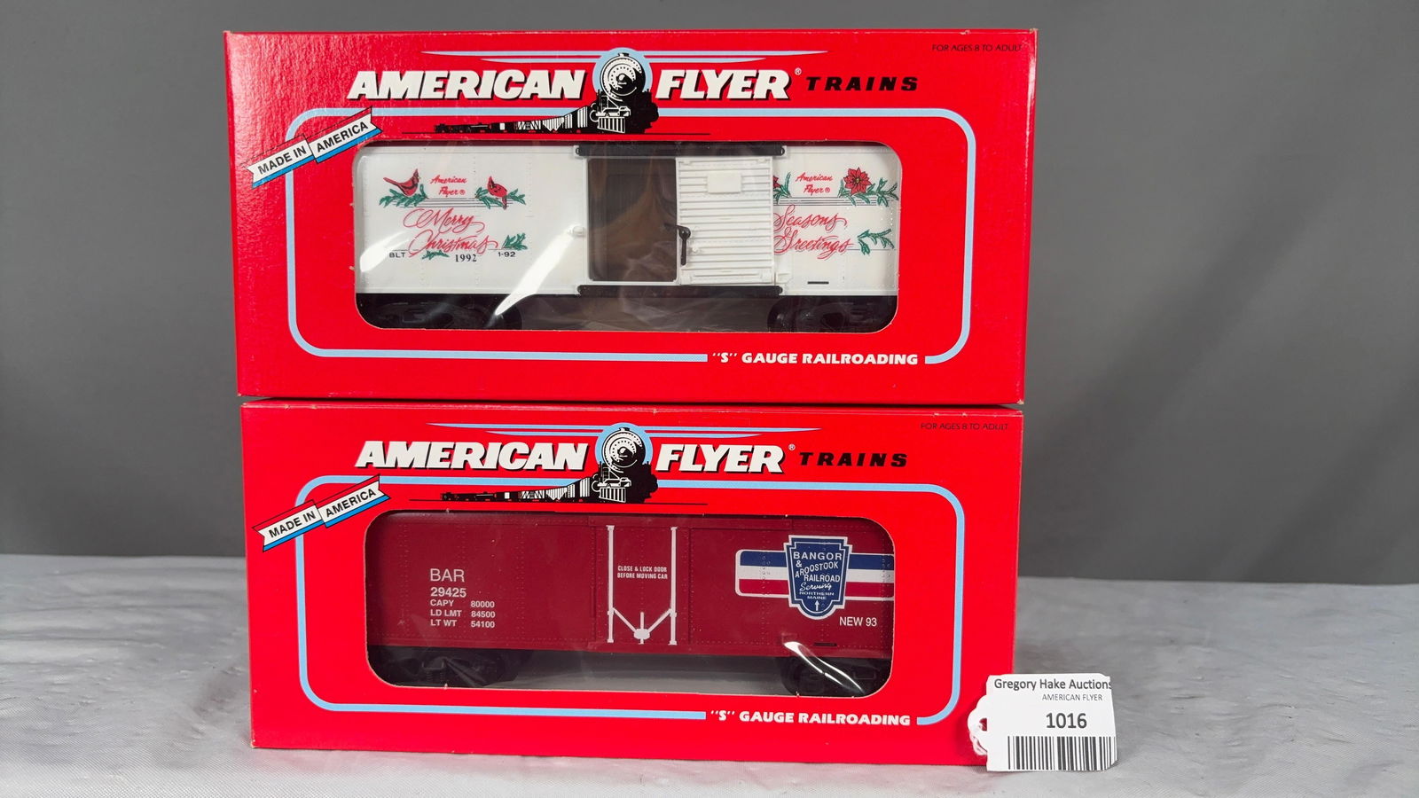 2 American Flyer Freight Cars 6-48316 Reefer and 6-48314 1992 Christmas Boxcar w/OBs: Lot of 2 American Flyer Freight Cars. Includes 6-48316 Reefer and 6-48314 1992 Christmas Boxcar w/OBs. C9. See photos for details. Size 11x5x5