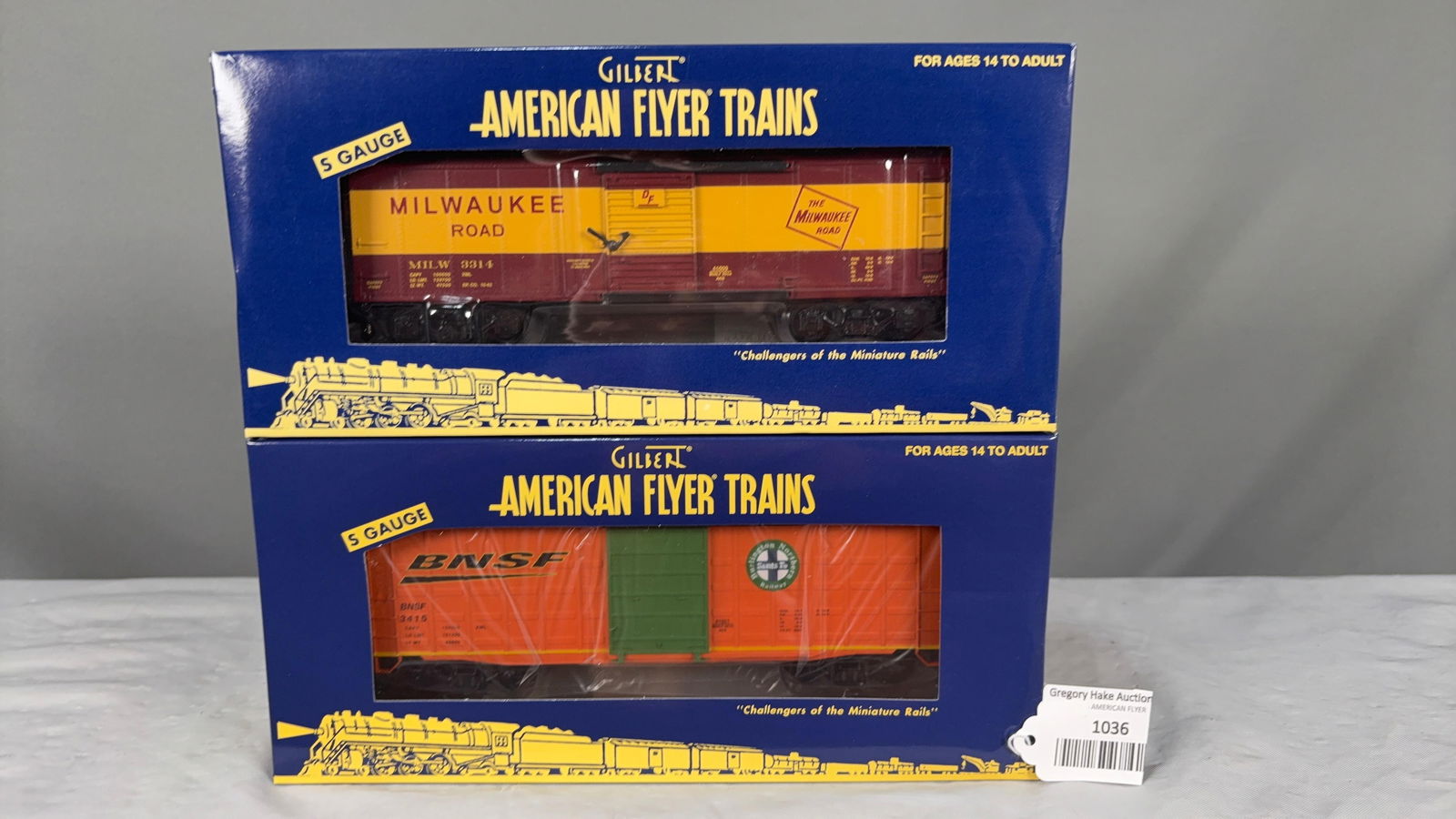 American Flyer NASG Milwaukee Road 41109 Boxcar and NASG Waffle Sided 41021 Boxcar w/obs: American Flyer NASG Milwaukee Road 41109 Boxcar and NASG BNSF Waffle Sided 41021 Boxcar C9. See photos for details.�Size11x5x5