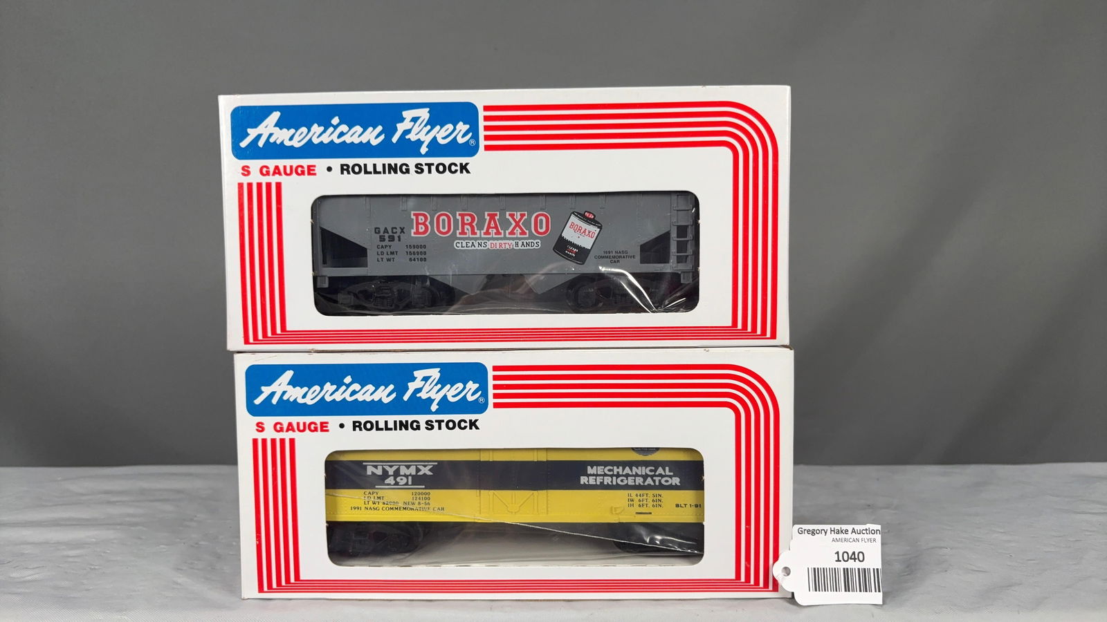 American Flyer (2) 1991 Commemorative NASG Freight Cars: 48436 & 48475 w/obs: American Flyer (2) 1991 Commemorative NASG Freight Cars. Includes 1991 48475 Borax Hopper Commemorative Car and NASG Commemorative 48436 NYMX Refrigerator Car w/obs. C9 See photos for