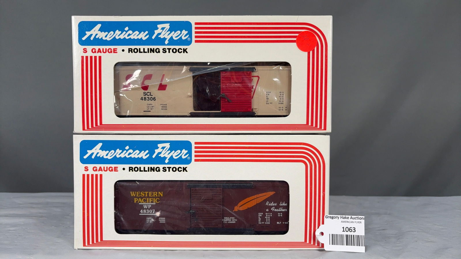 American Flyer Seaboard Coast Line Boxcar 48306 and Western Pacific Boxcar 48307 w/obs (1 of 2)