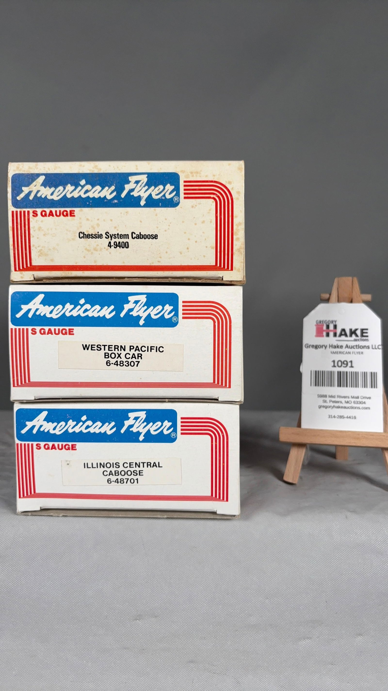 American Flyer 6-48701, 4-9400, 6-48307 w/ OBs: American Flyer 6-48701 Illinois Central Caboose, 4-9400 Chessie System Caboose, 6-48307 Western Pacific Boxcar w/ OBs. C9 See photos for details. Size 11x5x7