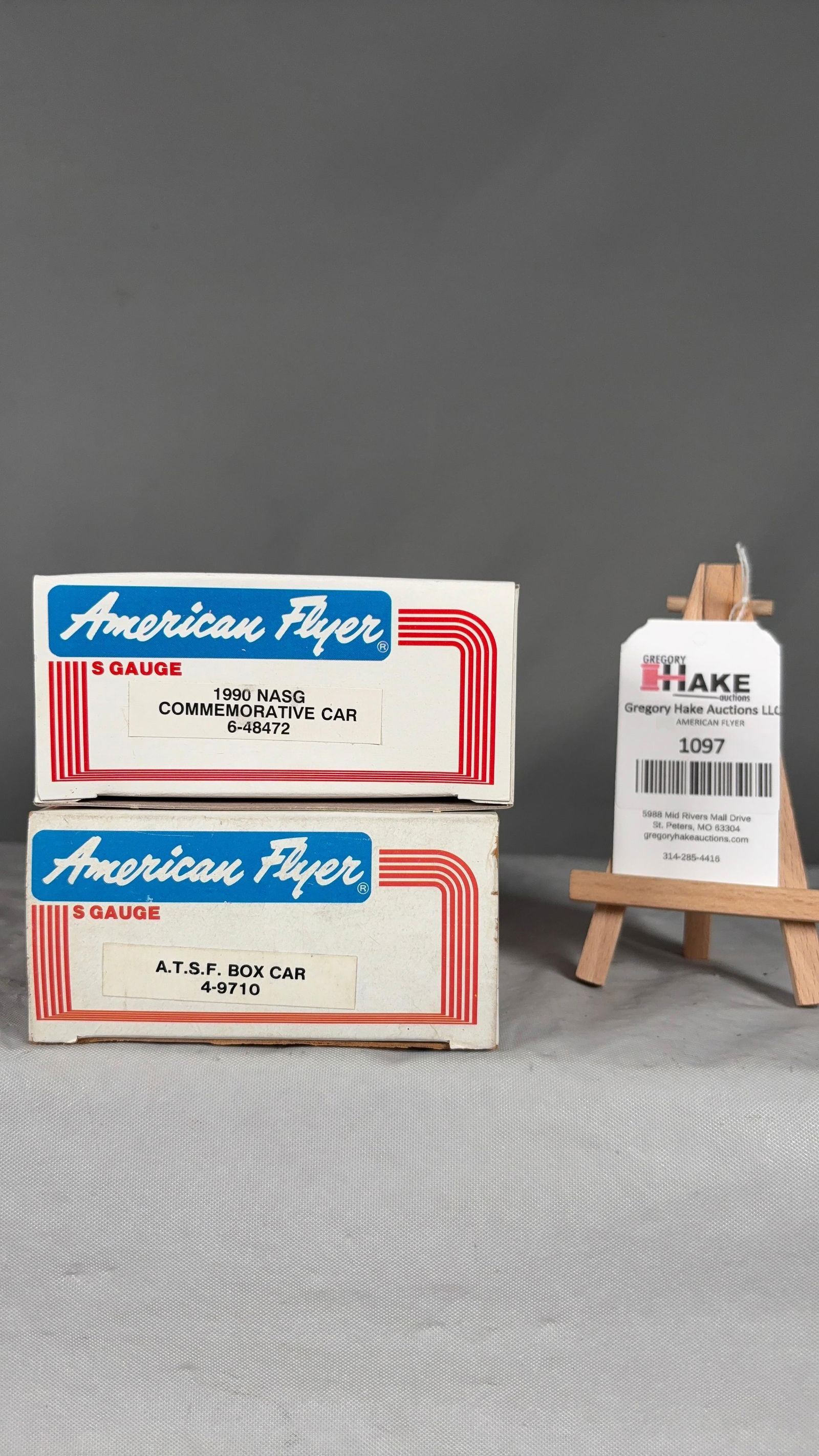 American Flyer 6-48472, 4-9710 w/ OBs: American Flyer 6-48472 1990 NASG Commemorative Car,� and 4-9710 A.T.S.F. Boxcar w/ OBs.�C9 See photos for detailsSize10x5x5