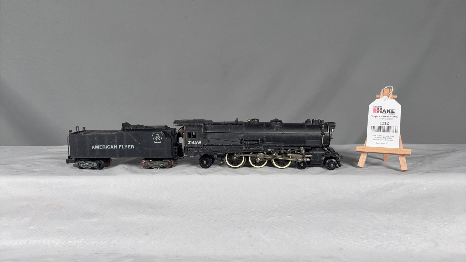 American Flyer Postwar 314 AW Steam Loco & Tender: American Flyer Postwar 314 AW Steam Loco & Tender. C7 See photos for details. Size 17x3x3