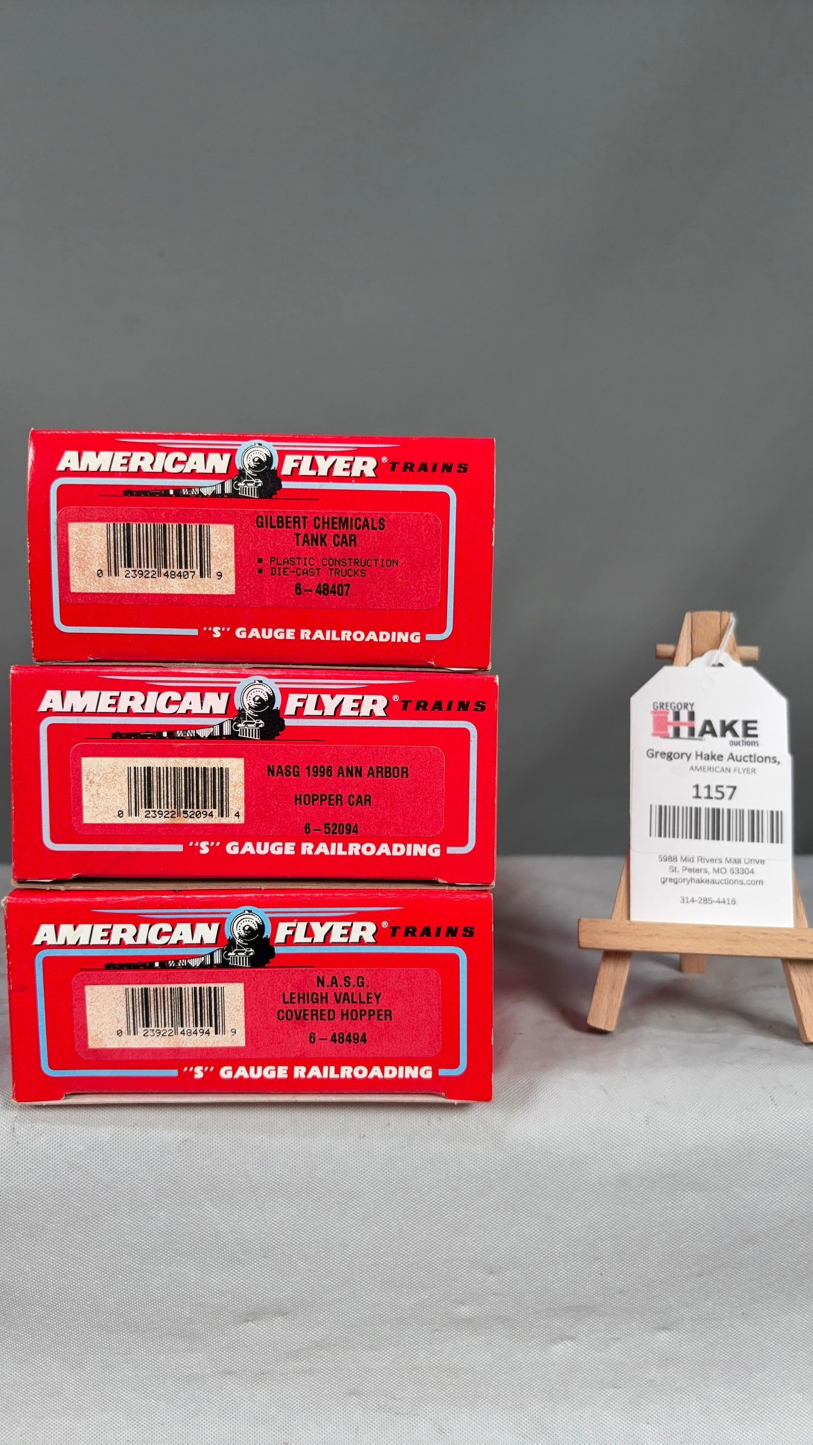 American Flyer 6-48407, 6-52094, 6-48494 w/ OB: American Flyer 6-48407 Gilbert Chemicals Tank Car, 6-52094 NASG 1996 Ann Arbor Hopper Car, 6-48494 NASG Lehigh Valley Covered Hopper w/ OB. C9 See photos for detailsSize11x5x8