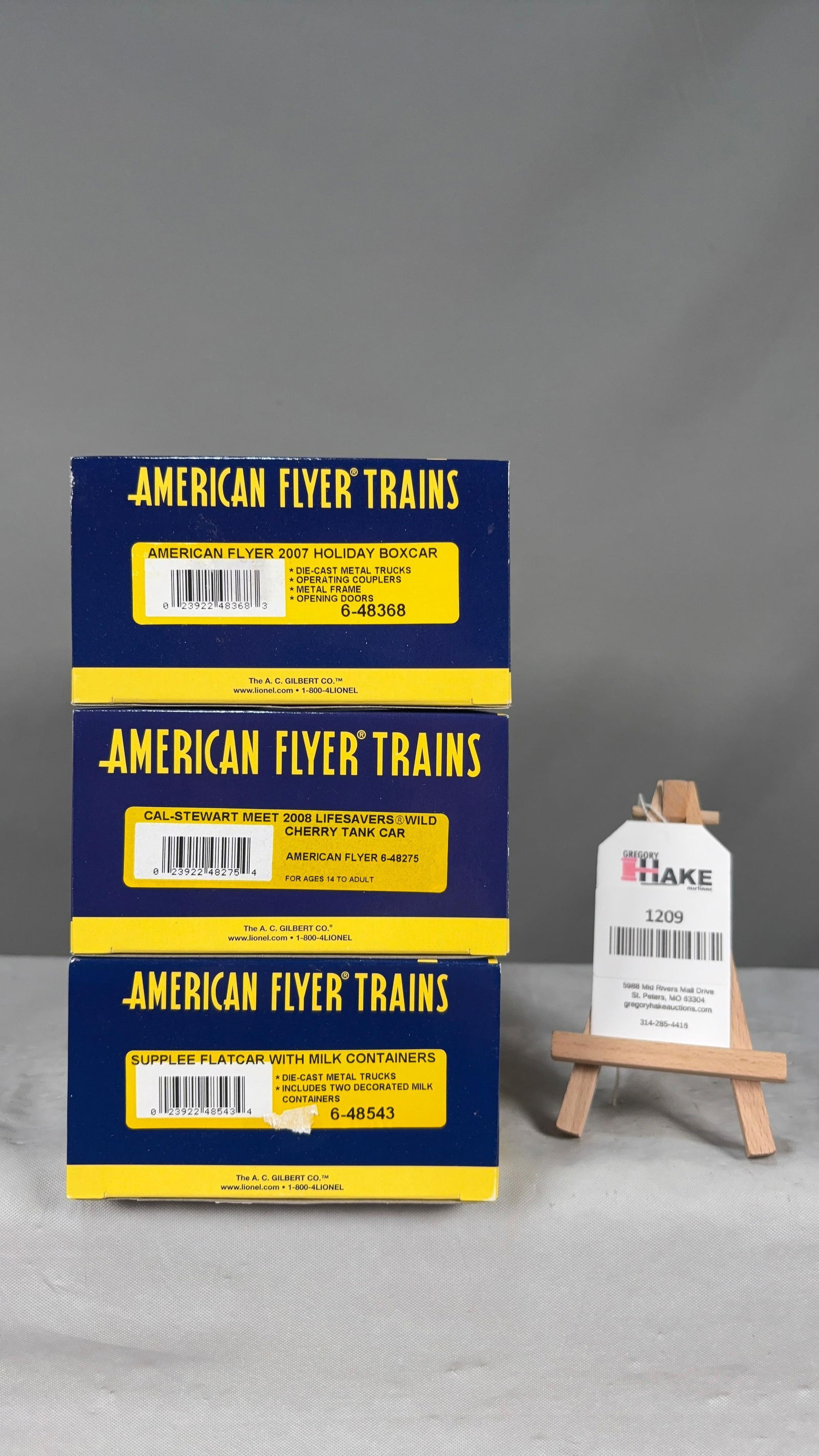 American Flyer 6-48275, 6-48368, 6-48543 w/ OBs: American Flyer 6-48275 Cal-Stewart Meet 2008 Lifesavers Wild Cherry Tank Car, 6-48368 A/F 2007 Holiday Boxcar, 6-48543 Supplee�Flatcar with Milk Containers w/ OBs, C10. Size 11x5x8