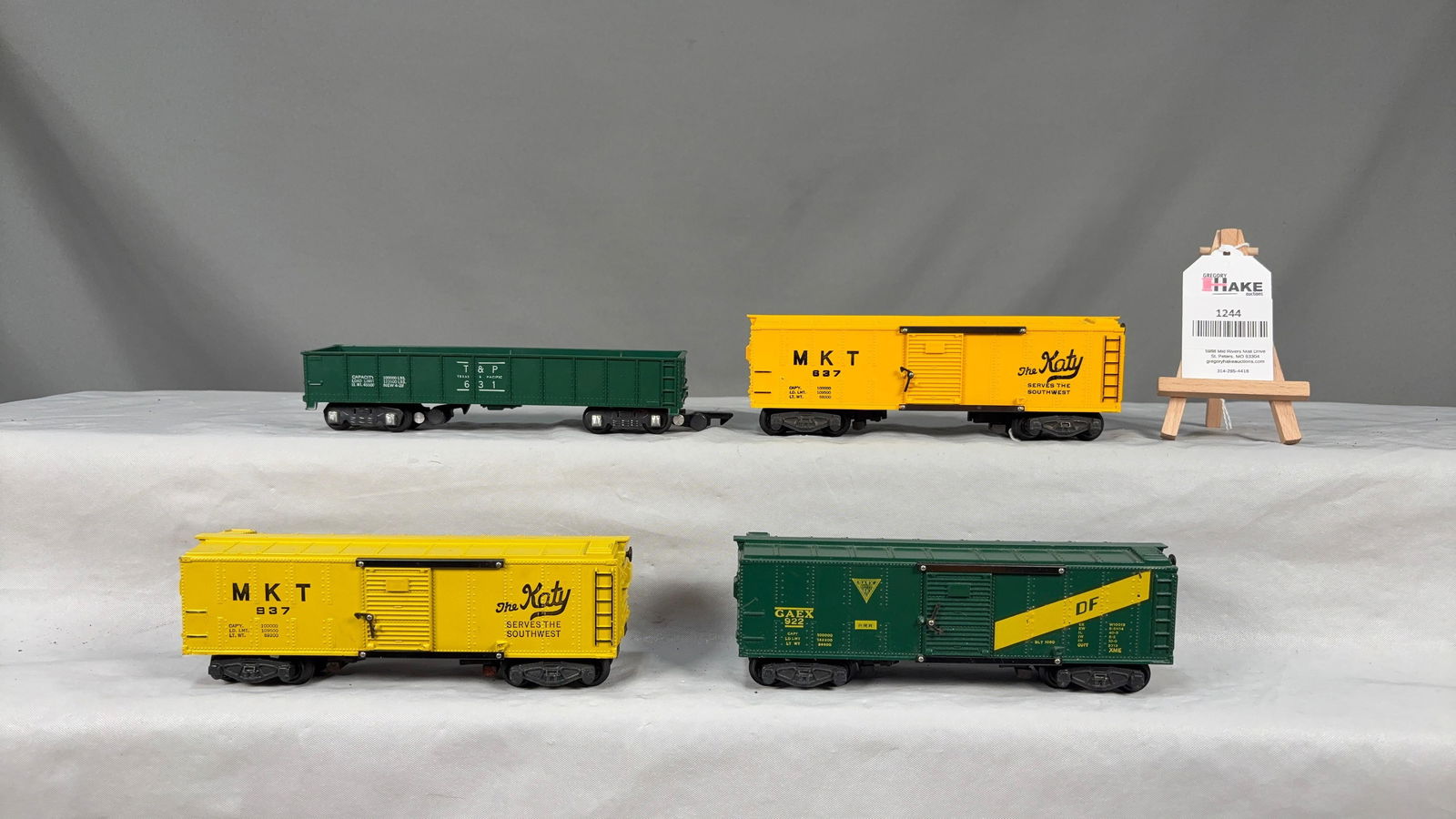 4 American Flyer Postwar Freight Cars - 2-637 Boxcars, 631 Gondola, 922 GAEX Boxcar w/ OB's - 2