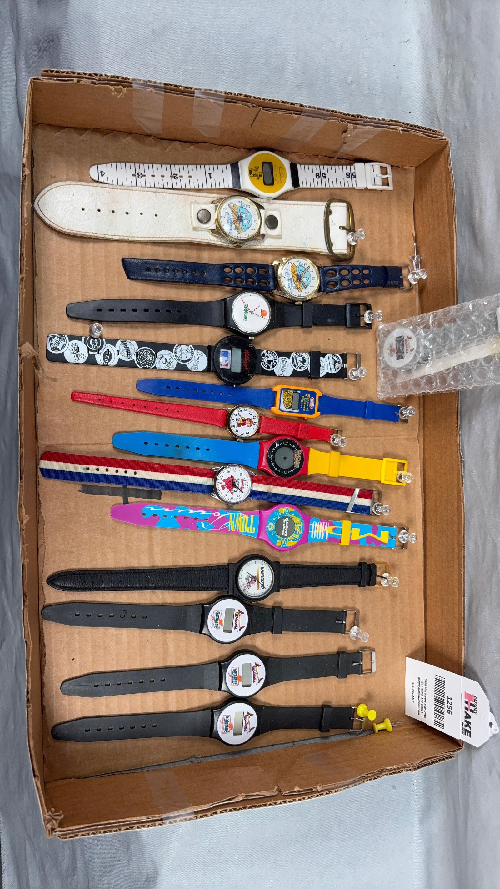 15 Character Watches Includes Back to the Future, Kool Aide, Energizer Kraft & more: 14 Character Watches Includes Back to the Future, Kool Aid, Energizer Kraft & more. See photos for Details.Size10x4x2