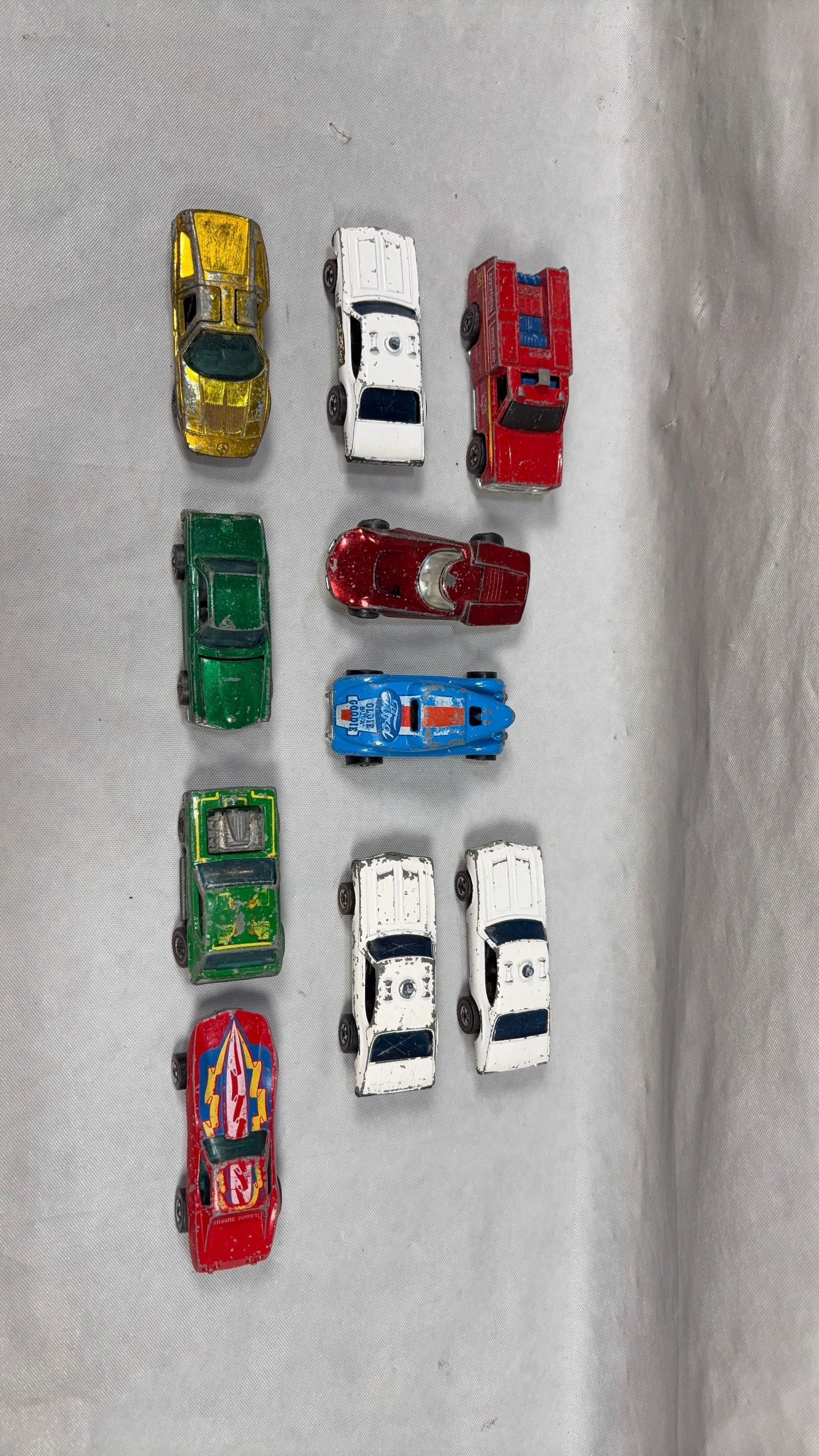 10 Vintage Hot Wheels Redlines: 10 Vintage Hot Wheels Redlines. All have wear. See Photo for Details. Size 5x7x1