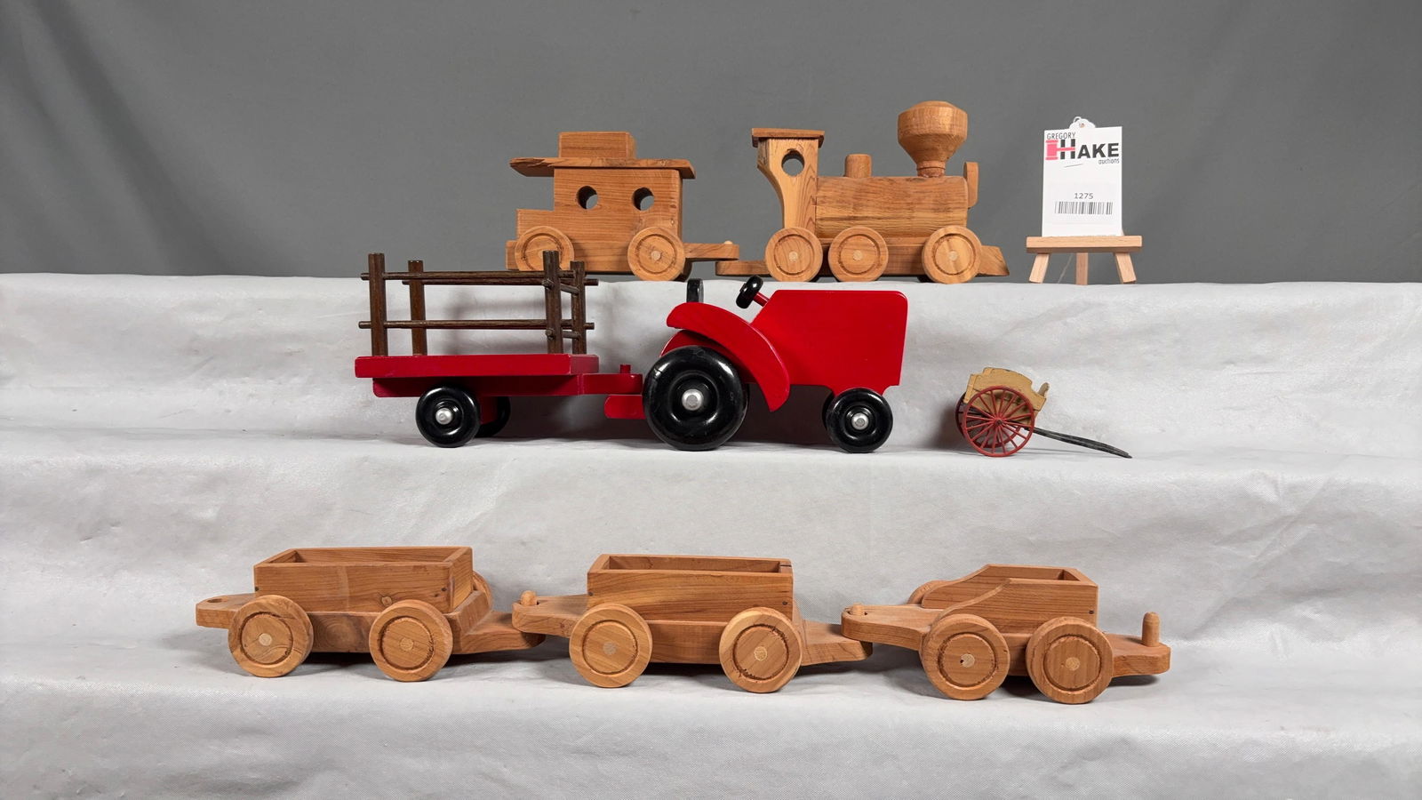 Lot of Wooden Toys: Lot of Wooden Toys, Trains and Tractors, C7. See photos for Details.Size16x13x4
