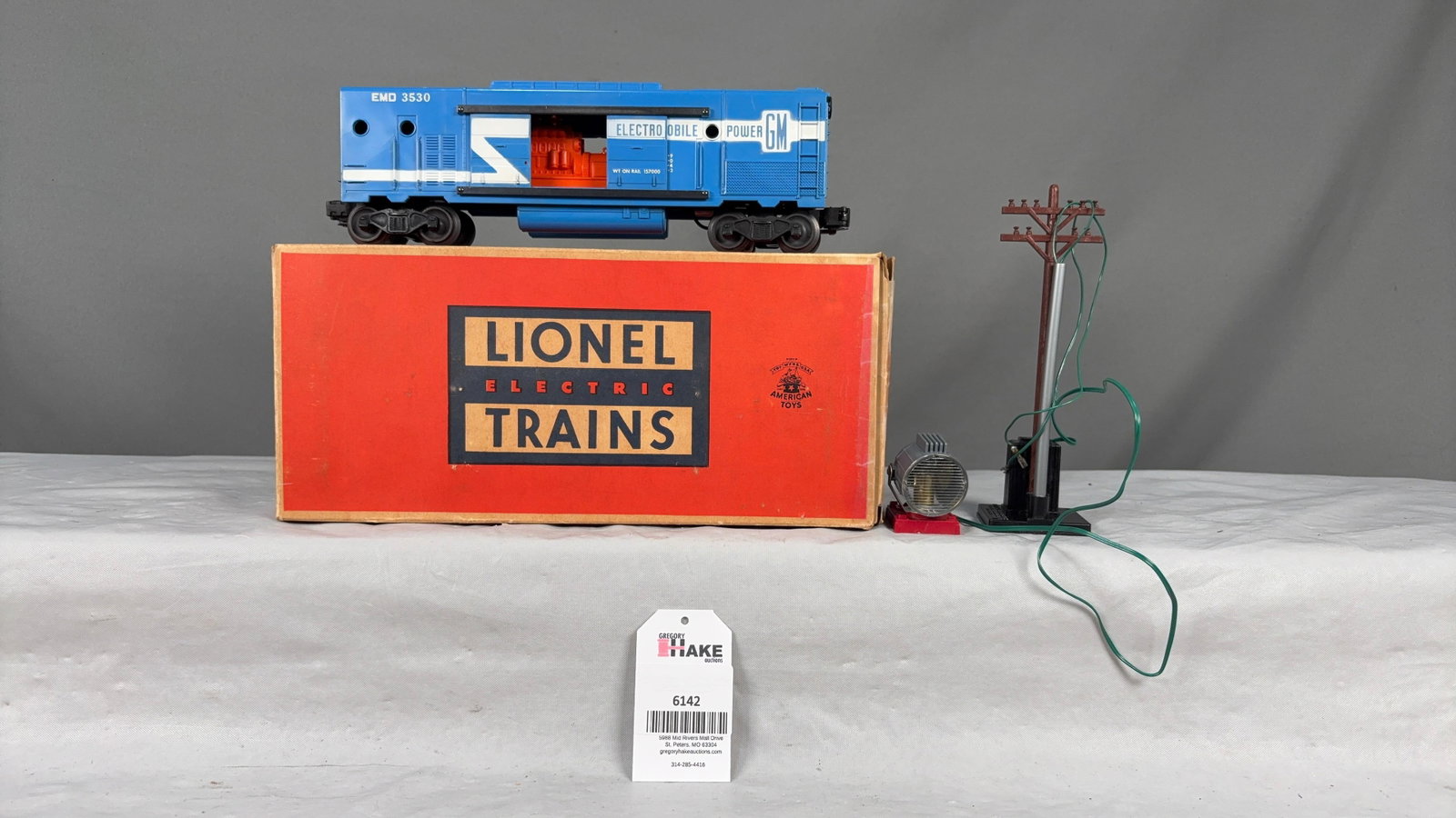 Lionel Postwar 3530 Generator Car w/OB: Lionel Postwar 3530 Generator Car w/OB, C7. Car is long stripe variation with black transformer face. Original box is square and missing one flap and insert.?