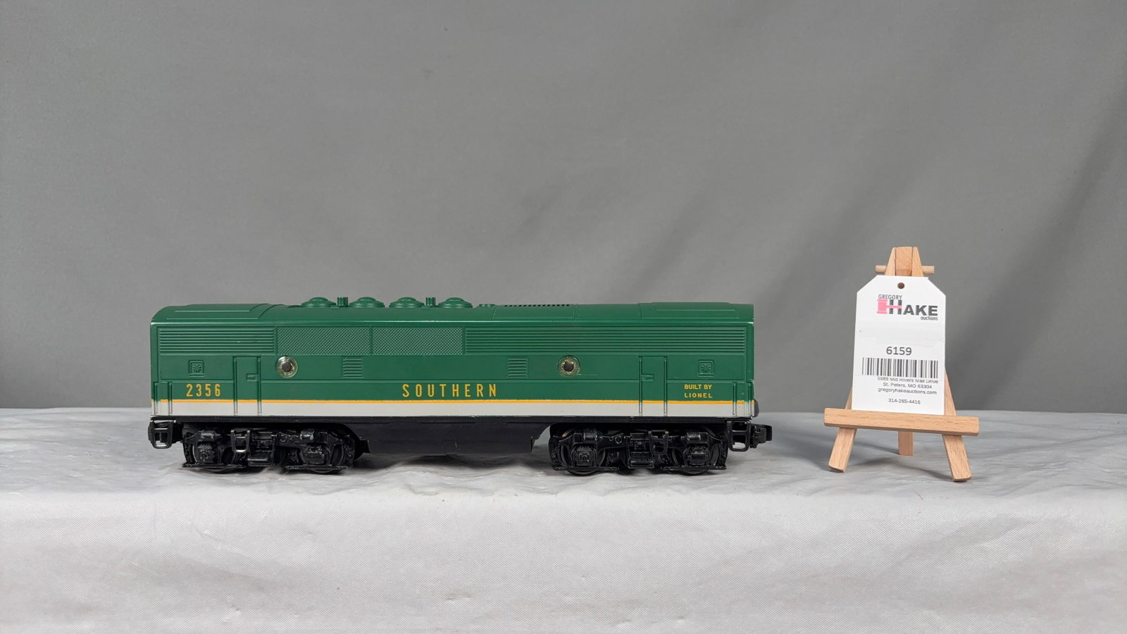 Lionel Postwar 2356 C Southern B Unit: Lionel Postwar 2356 C Southern B Unit. There is a pin dot size paint area missing from the rooftop otherwise C8.?