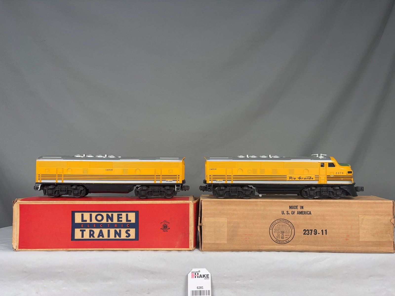 Lionel Postwar 2379 Rio Grande F3 AB Diesel Locomotives w/OB: Lionel Postwar 2379 Rio Grande F3 AB Diesel Locomotives w/OB. Locomotives have beautiful paint and graphics, nose decal has flaking on the vents otherwise both pieces C8. Boxes have light wear and inc