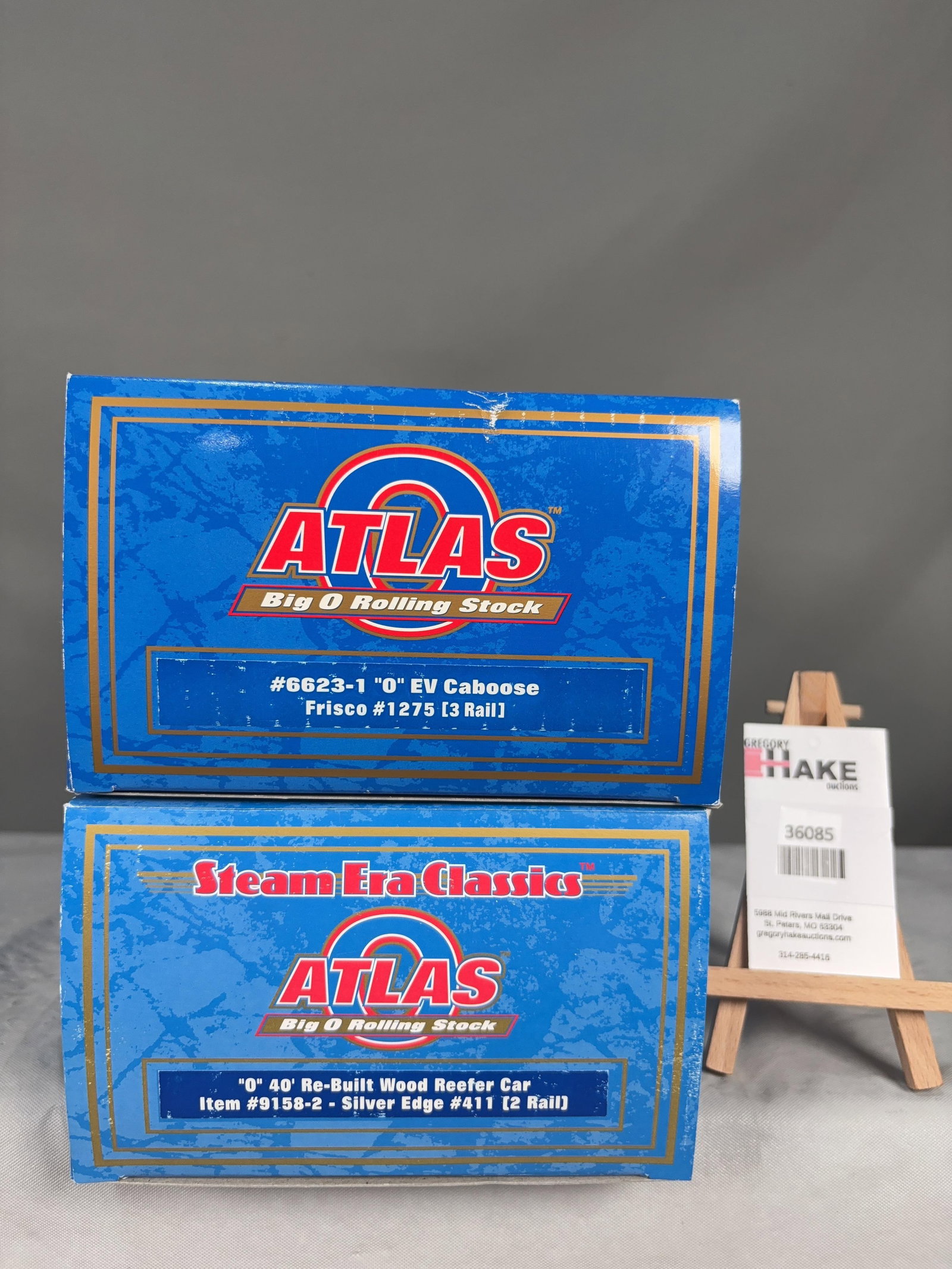 2 Atlas O Scale Caboose and Reefer Cars w/OB's: 2 Atlas O Scale Frisco�1275 Caboose and Silver Edge 9158-2 Reefer Cars w/OB's, C8. Size 17x6x8