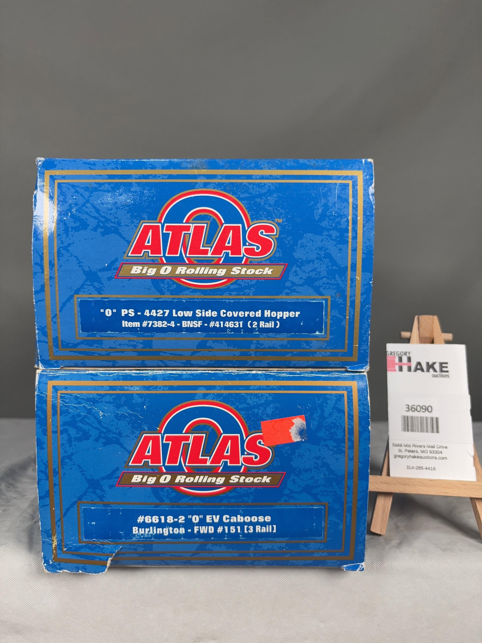 2 Atlas O Scale Hopper & Caboose Cars w/OB's: 2 Atlas O Scale BNSF 7382-4 Hopper & Burlington 6618-2 Caboose Cars w/OB's, C8. Size 17x6x8