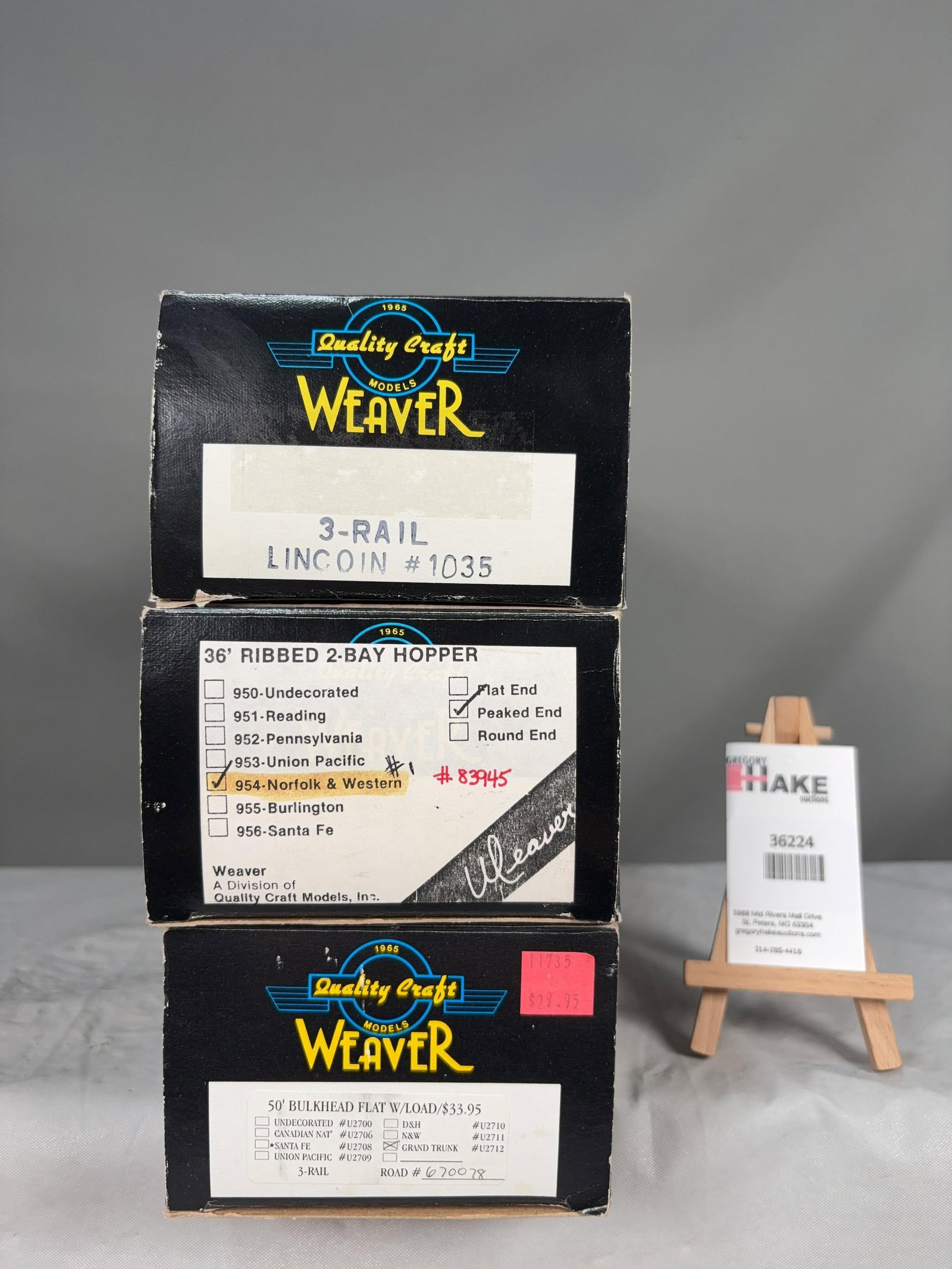 Weaver Set of 3 cars w/OB's: Weaver Set of 3 cars w/OB's 3-Rail Lincoln 1035, 36' Ribbed 2 Bay Hopper 954 N&W, 50' Bulkhead Flat w/ Load Grand Trunk U2712 670078 w/OB, C8 Size 15x9x5