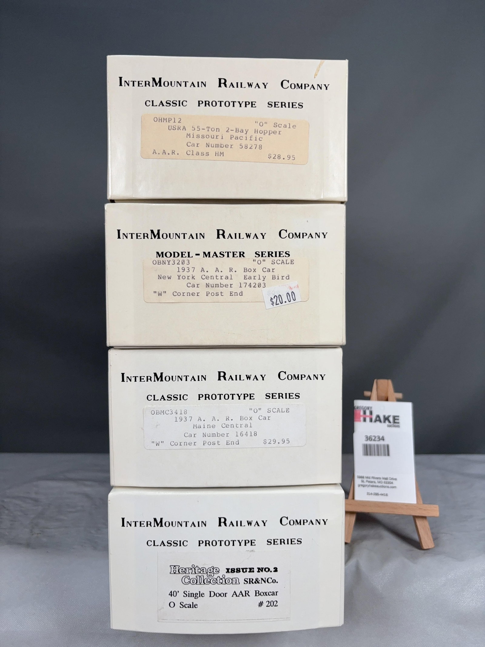 InterMountain Railway Company Set of 4 O Scale w/OB's: InterMountain Railway Company Set of 4 O Scale w/OB's: 1937 Boxcar Maine Central 16418, 40' Single Door AAR Boxcar 202,�1937 Boxcar New York Central Early Bird 174203, USRA 55 Ton 2 Bay Hopper