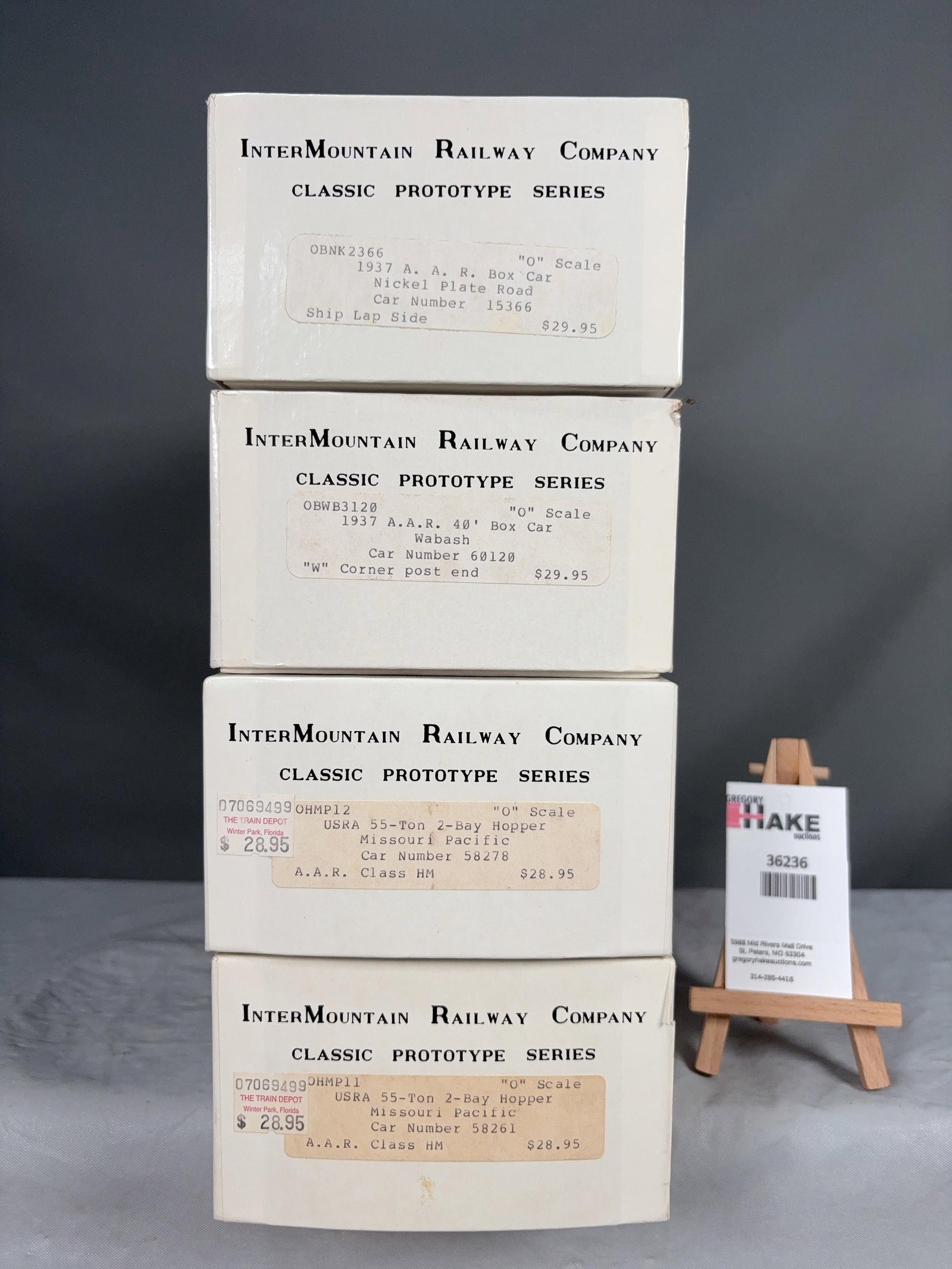 InterMountain Railway Company Set of 4 O Scale w/OB's: InterMountain Railway Company Set of 4 O Scale w/OB's:� 1937 40' AAR Boxcar Nickel Plate Road 15366,�1937 40' AAR Boxcar Wabash 60120,� USRA 55 Ton 2 Bay Hopper Missouri Pacific