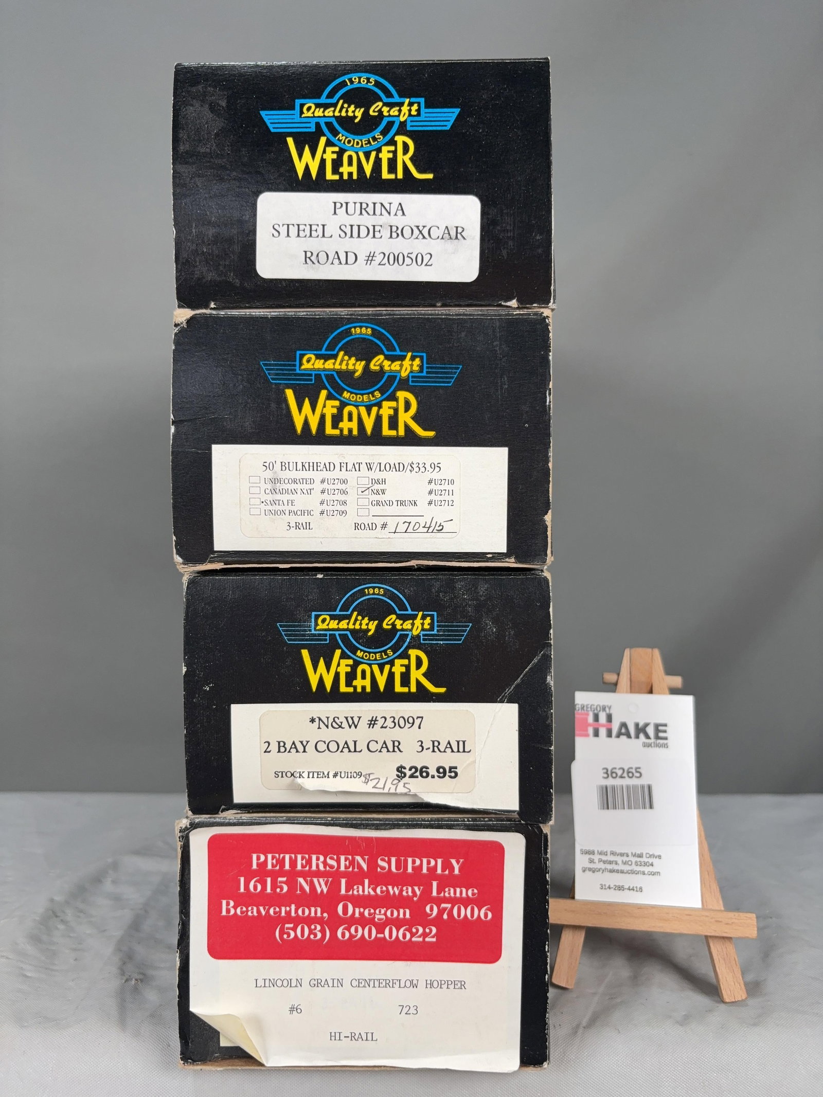 4 Weaver Cars w/OB's: 4 Weaver Cars w/OB's:�Purina Steel Side Boxcar, N&W Bulkhead Flat w/ Load, N&W Coal Car, Lincoln Grain Centerflow Hopper w/OB, C8 Size 15x10x6