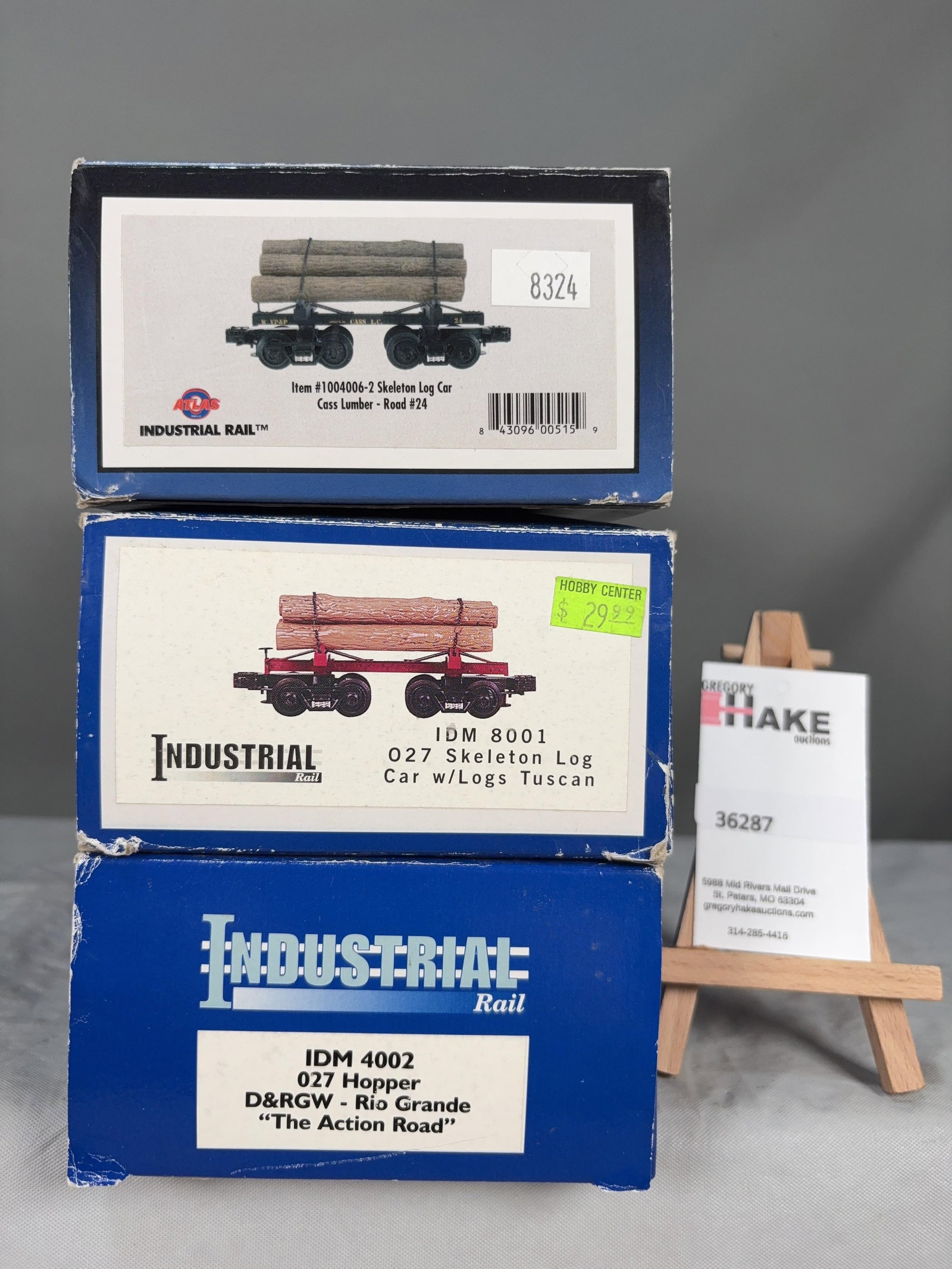 3 Atlas Cars w/OB's: 3 Atlas Cars w/OB's: 2 Skeleton Log Cars, Rio Grande Hopper, C8.� � Size 12x5x8