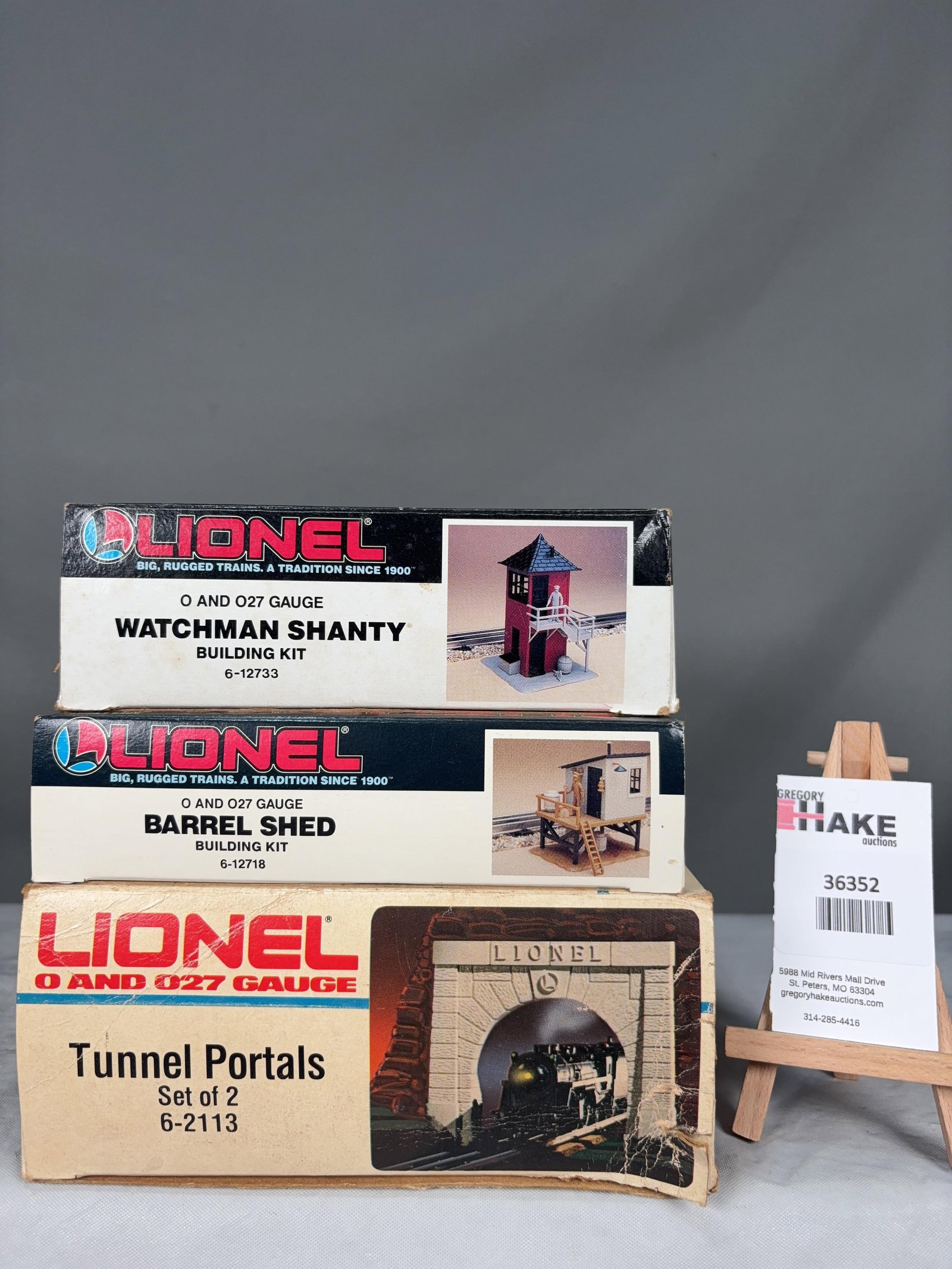3 Lionel Accessories w/OB's w/ OB: 3 Lionel Accessories w/OB's: Watchman Shanty Building Kit 12733, Barrel Shed 12718 and Set of 2 Tunnel Portals 2113, C9 � Size 9x8x7