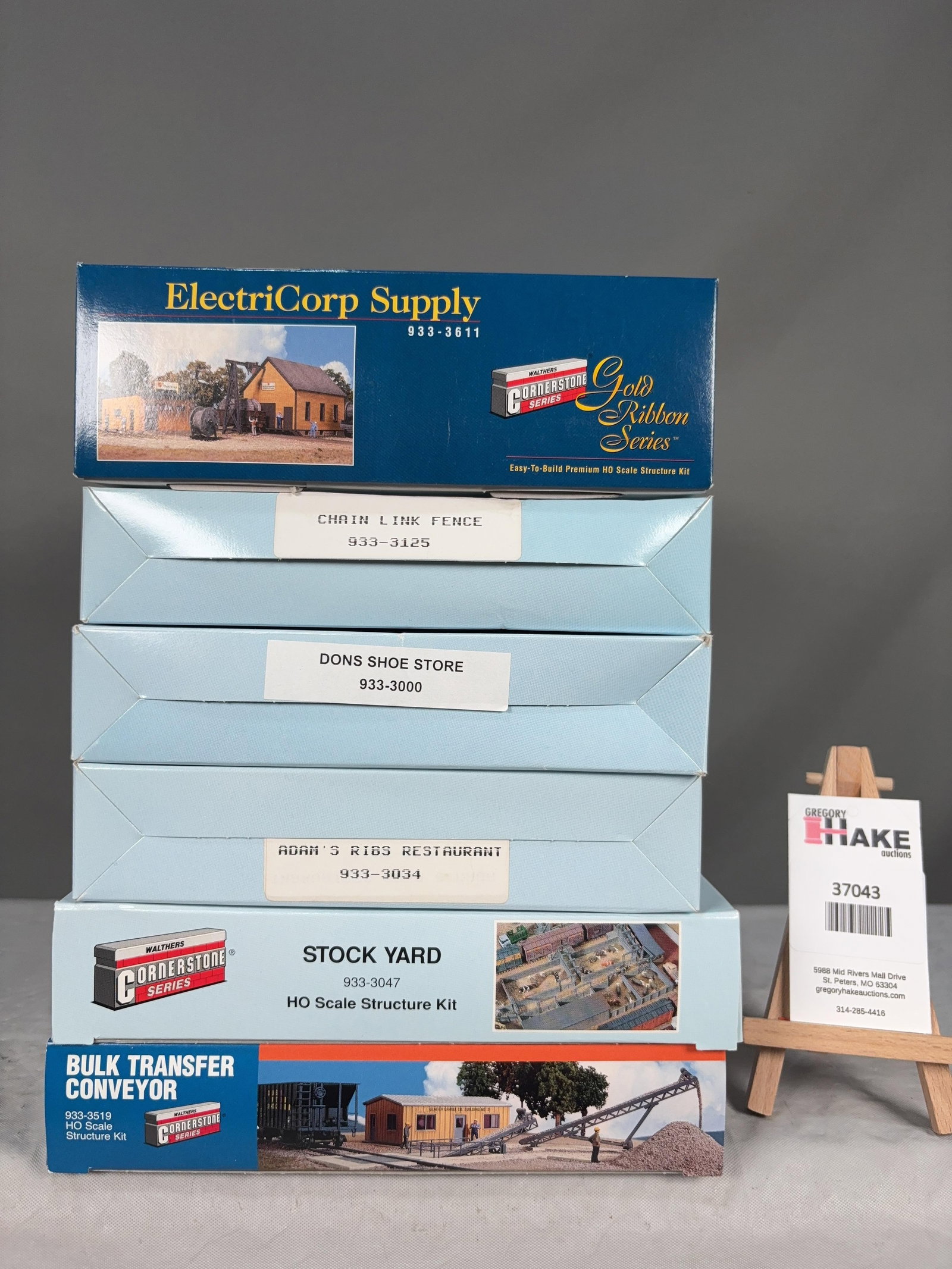 6 Walthers Cornerstone Series Structure Kits w/OB: 6 Walthers Cornerstone Series Structure Kits w/OB. ElectriCorp Supply 933-3611, Chain Link Fence 933-3125, Don's Shoe Store 933-3000, Adams' Rib Restaurant 933-3034, Stock Yard 933-3047, Bulk