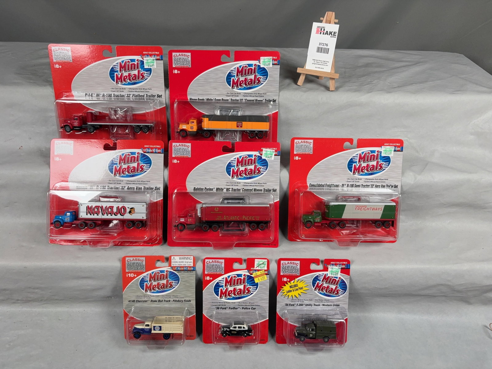 8 Mini Metals Trucks & Cars in original packaging: 8 Mini Metals Trucks & Cars in original packaging. Please See Photos for Details, C9. � Size 15x12x3