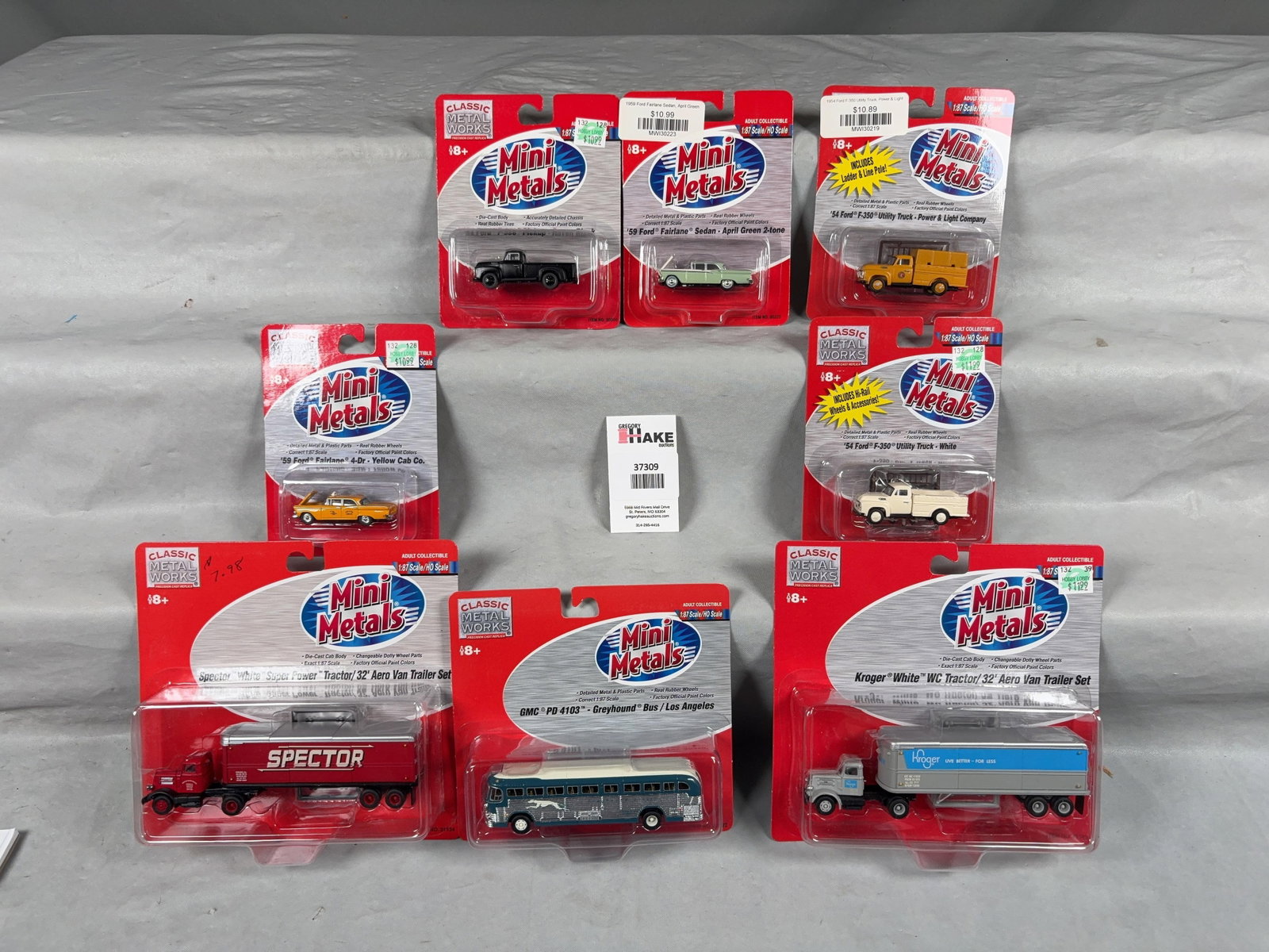 8 Mini Metals Trucks, Bus, Vehicles in original packaging: 8 Mini Metals Trucks, Bus, Vehicles in original packaging.�Please see photos for details, C9. � Size 16x8x5