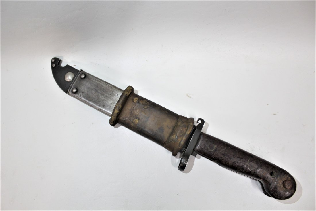 WW2 Knife Bayonet: WW2 Bayonet stamped TU- 1560. With leather and metal Sheath Dimensions: 13 inches in length in sheath Condition: Good Please feel free to ask for a condition report. Expand photos to see additional de