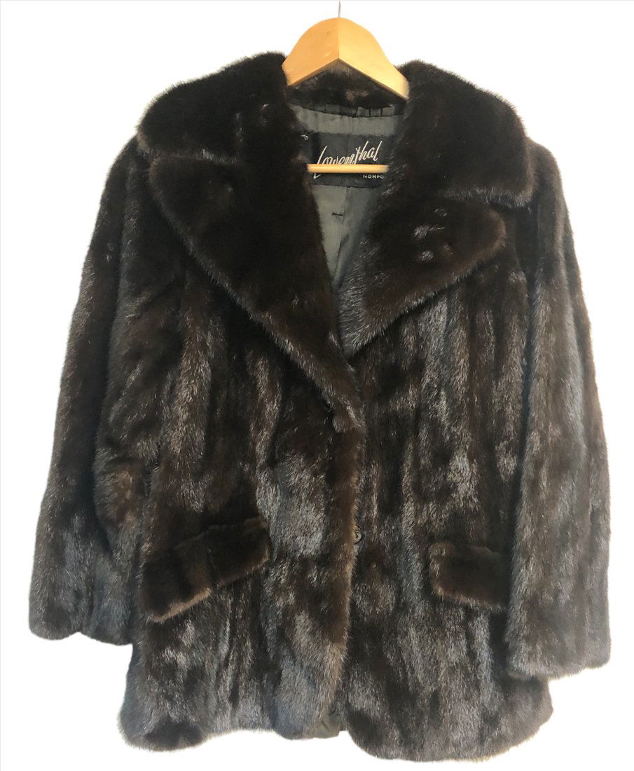 Givenchy Mink Jacket: Givenchy Mink jacket. Has separation of pelts on one sleeve. Fur is in good condition no shedding Dim : Size not marked. 30 inches overall length x 18 inches arm pit to arm pit x. Sleeve length 22 inc