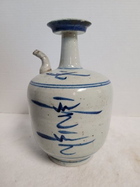 Antiquity Chinese Blue & White Bottle: Chinese antique 14th-16th century wine or oil bottle. Dimensions: 10 by 6 by 6 inches deep. Condition: Spout reglued. Please feel free to ask for a condition report. Expand photos to see additional de