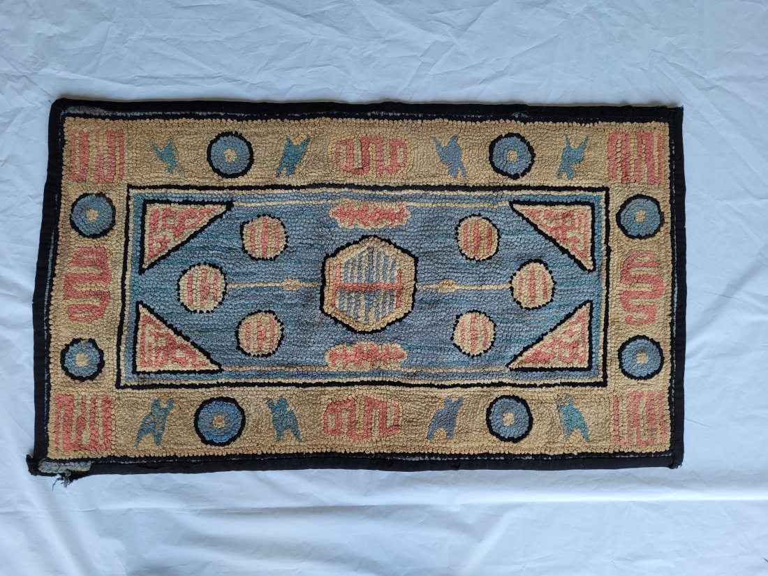 19th Century American Folk Art Hooked Rug: 19th century American hooked folk art rug. Dimensions: 39 by 22 inches. Condition: good. Please feel free to ask for a condition report. Expand photos to see additional details. Please use the link to