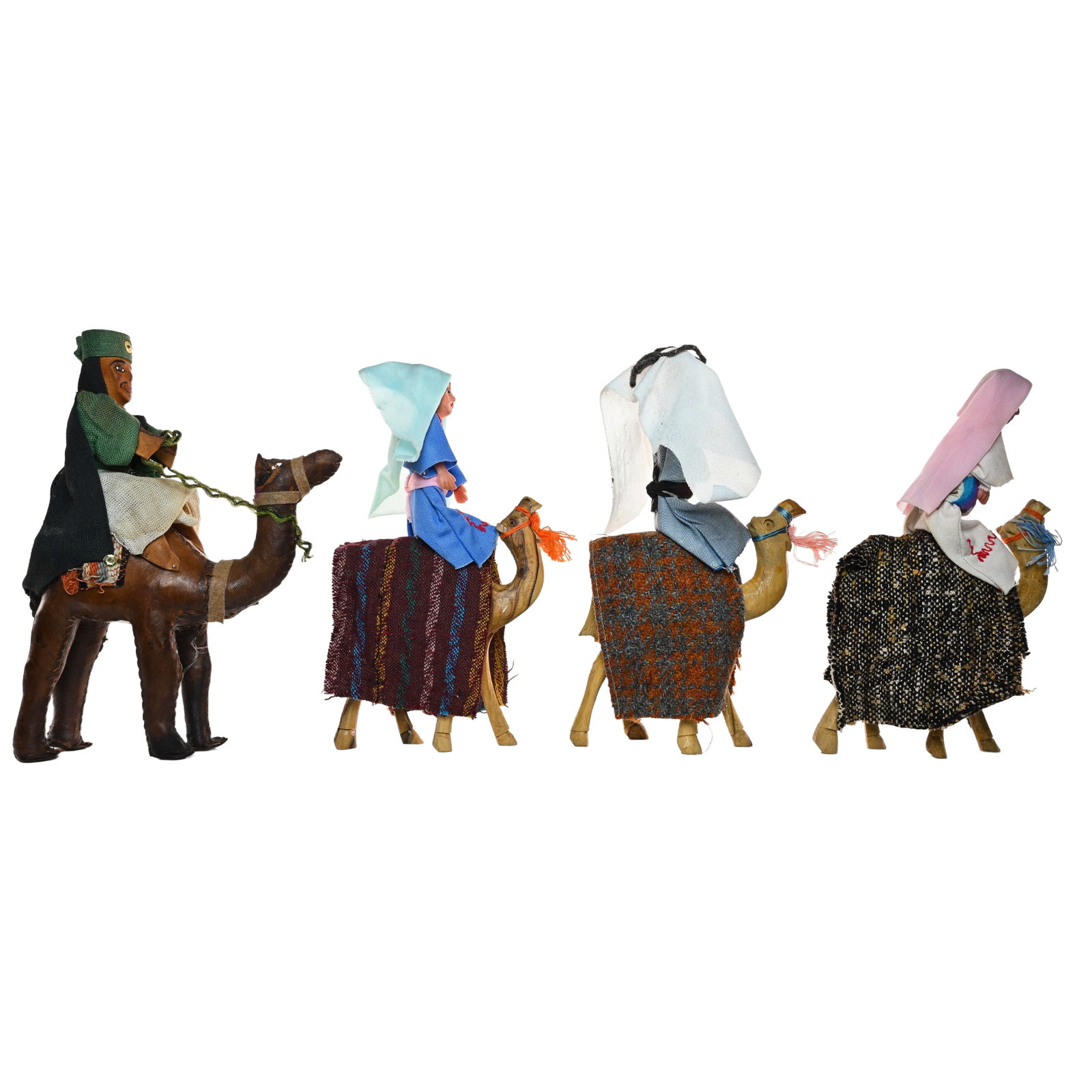 Lot of 4 Vintage Camel Rider Dolls: Lot of 4 Vintage Camel Rider Dolls. Each measures approximately 9"H x 6"W x 2"D.
