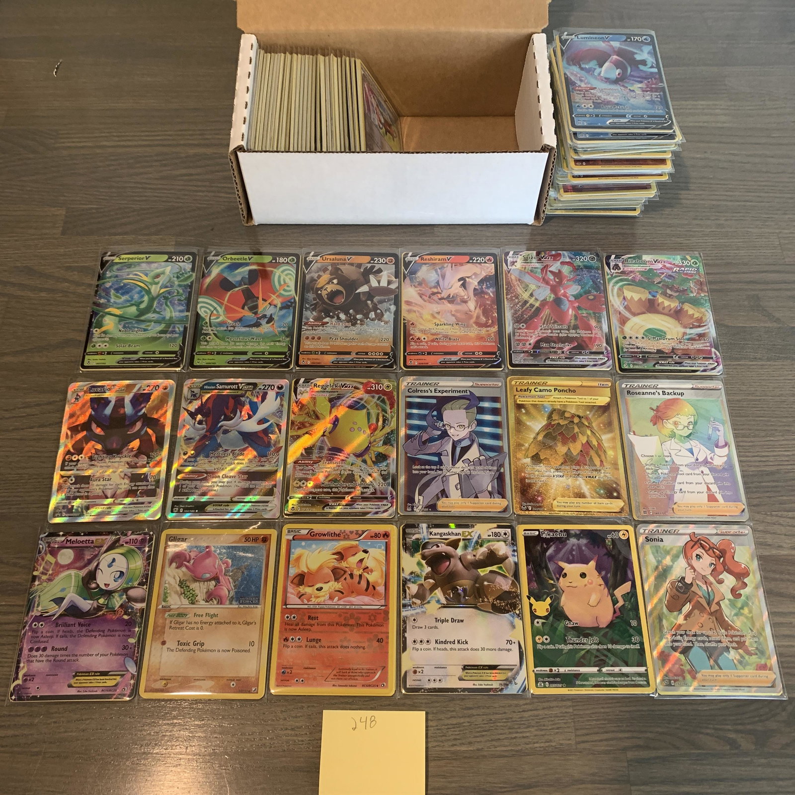 Huge Box of Modern Pokemon Cards: 100s of Modern Pokemon cards. Includes Vs, Ex, Vmax, holos, Reverse holos, etc. See photos for conditions. Now accepting Consignments!