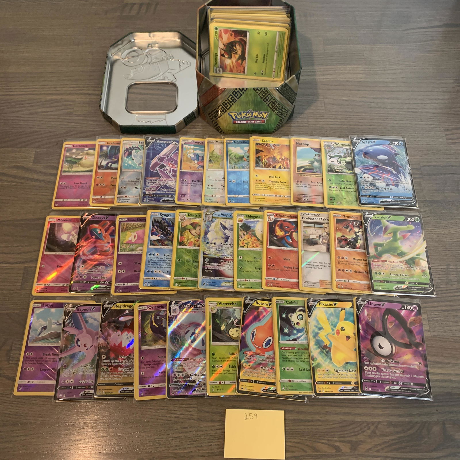 Pokemon card tin and cards (1 of 4)