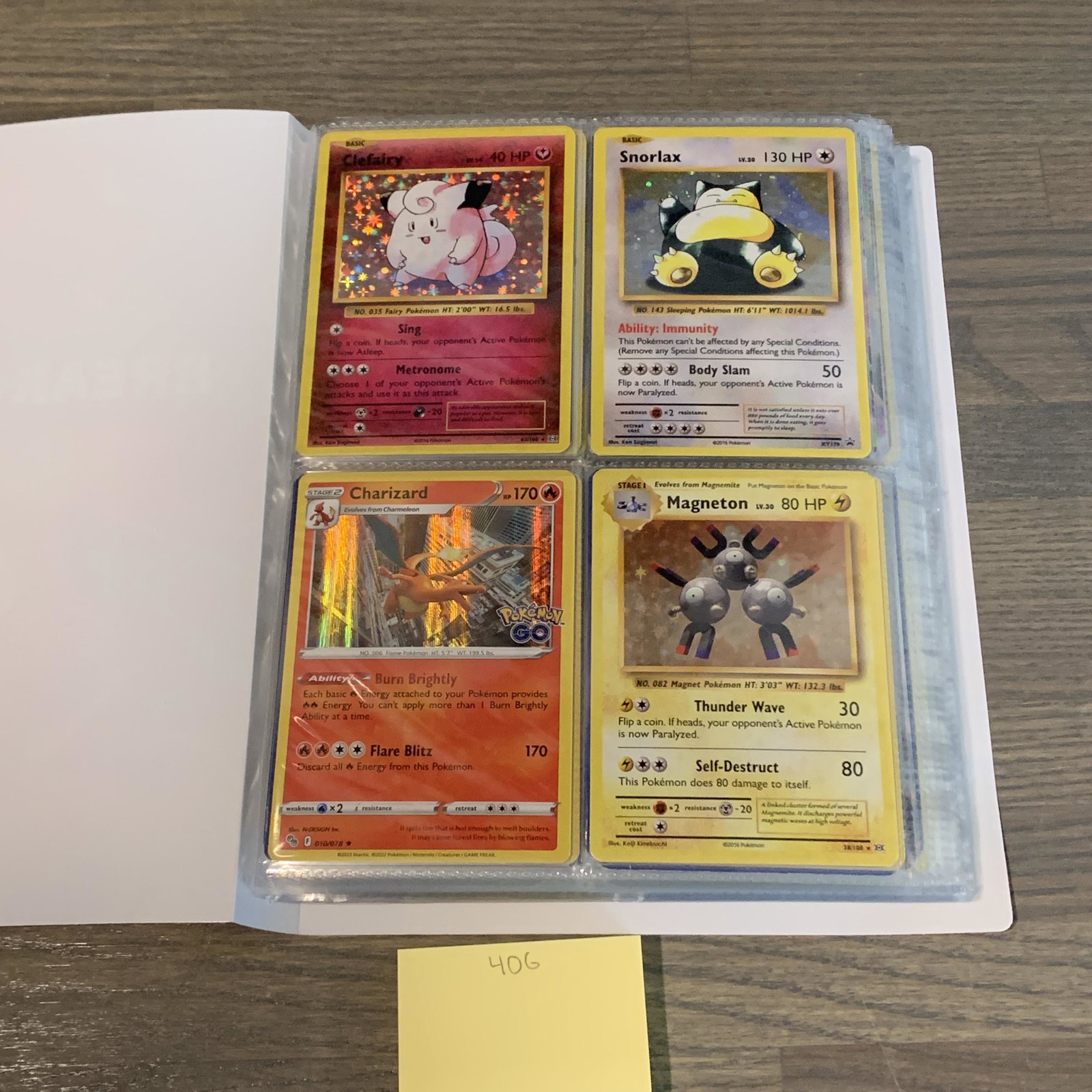 Modern Pokemon card binder: Four count page binder filled with 100s of modern pokemon cards. Includes EX, GX, Vmax, Vs, holos, Rev holos, etc. See photos for conditions. We are now accepting consignments! Happy Bidding!