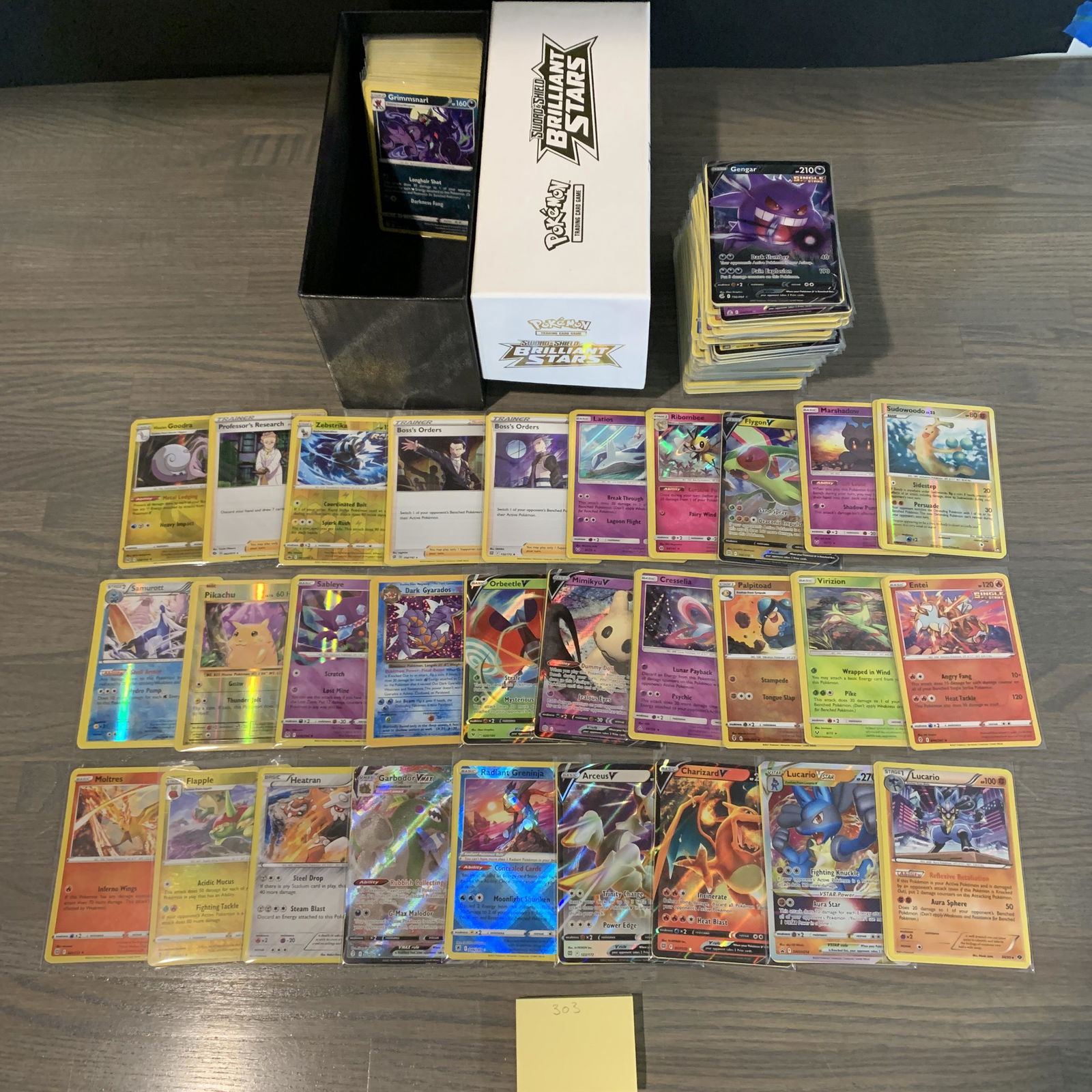 ETB filled with Modern Pokemon cards: ETB filled with 100s of modern Pokemon cards. See photos for conditions. We are currently accepting consignments. Email us a aeronhouse1994@gmail.com or visit our website, www.ahauctionhouse.com