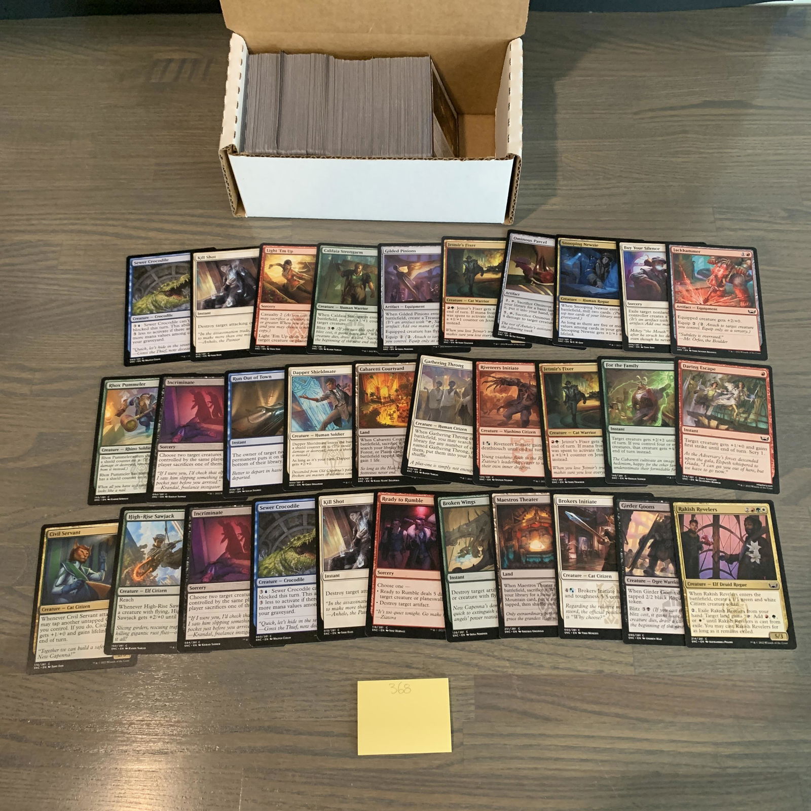 Box of Streets of New Capenna Magic Cards (1 of 2)