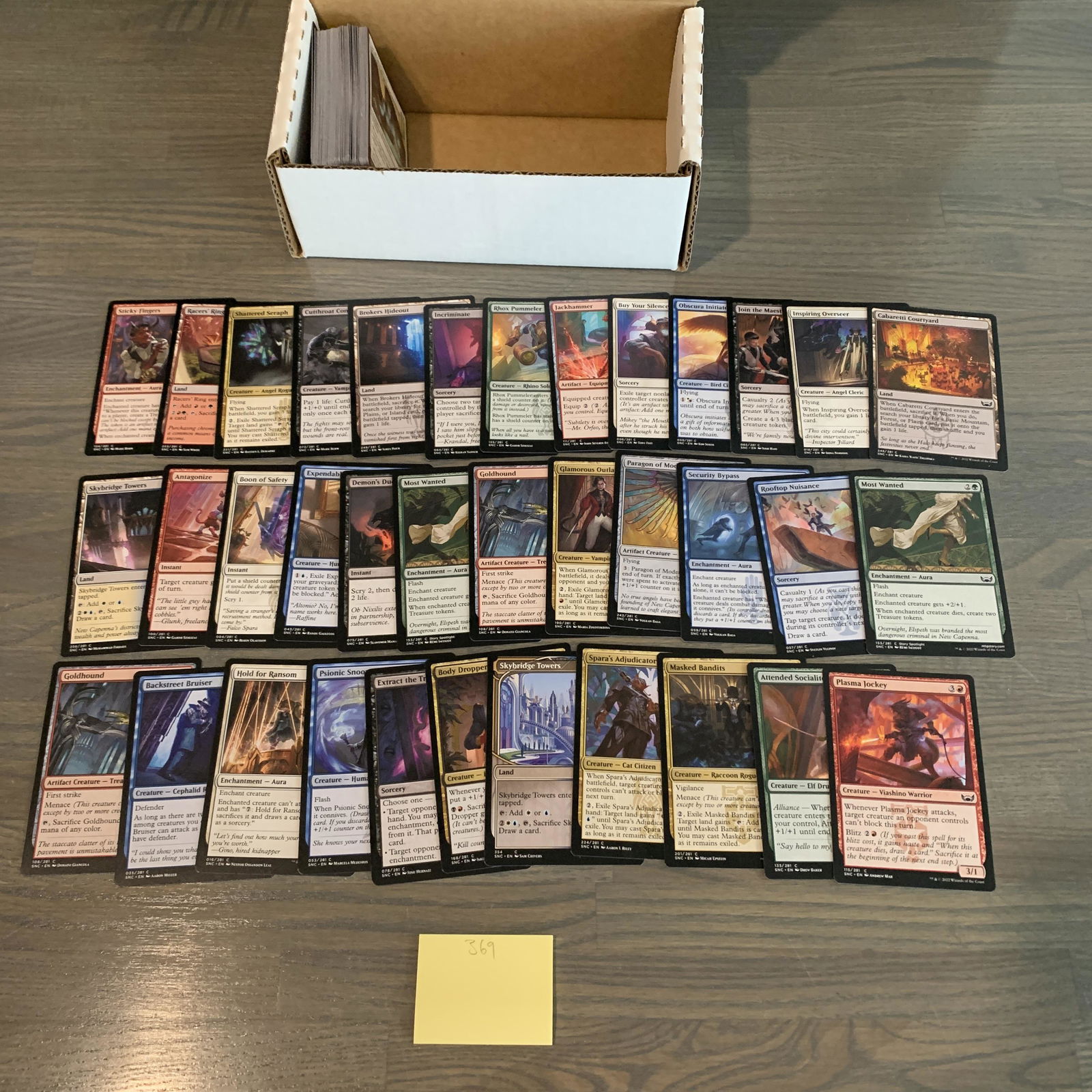 Box of Streets of New Capenna Magic Cards (1 of 3)