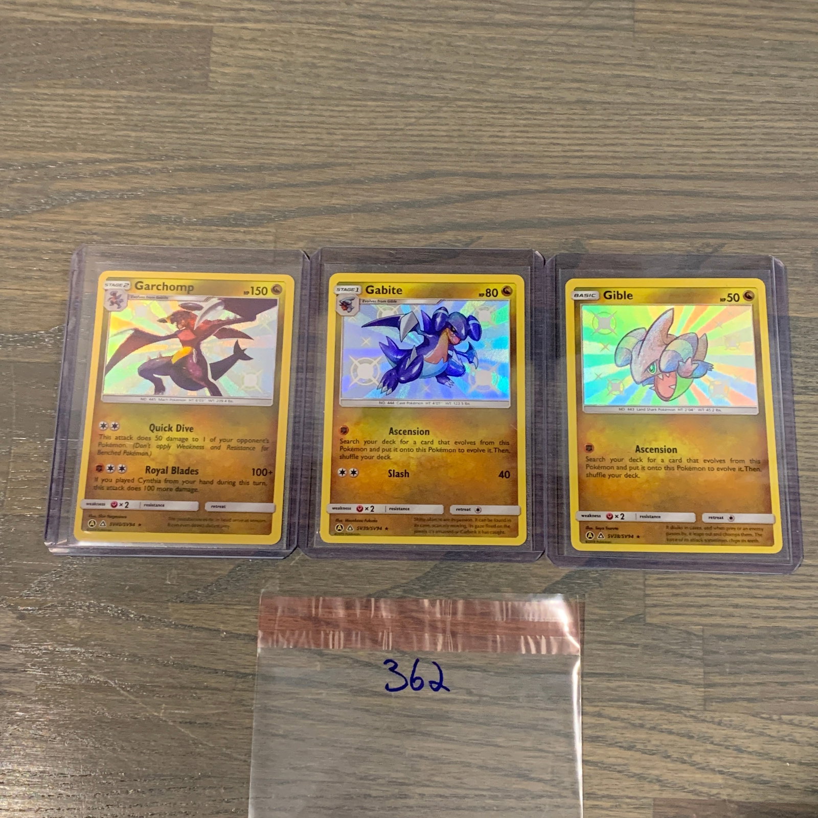 Shiny Garchomp Evolution Pokemon Cards: Shiny Garchom #SV40, Gabite #SV35, Gible #SV38. We are a veteran owned company. Please look at the pictures carefully to determine what you believe the condition of collectible is. We are currently ac