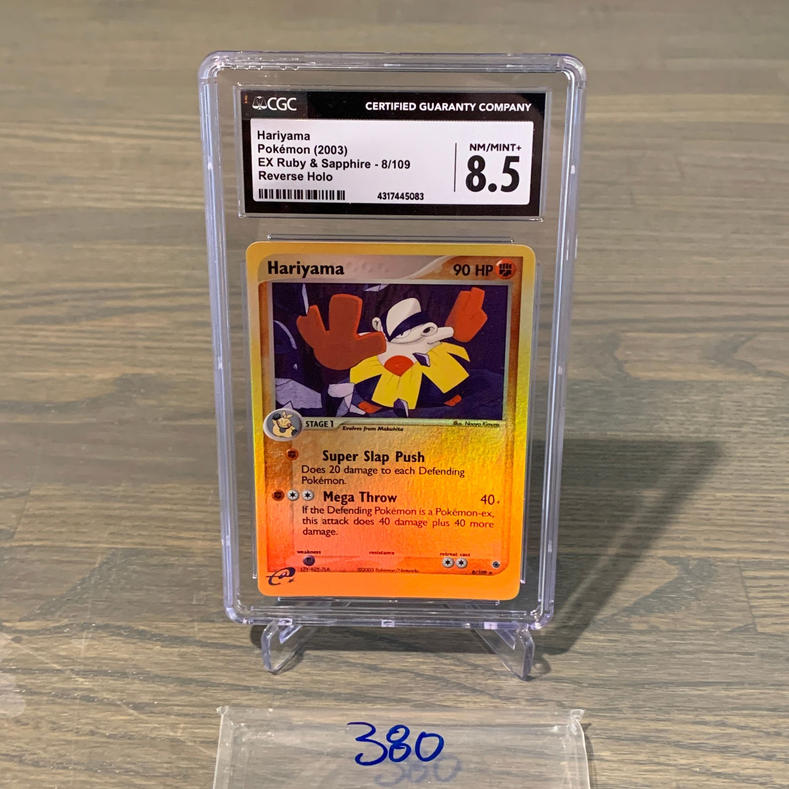 CGC 8.5 Hariyama Reverse Holo Pokemon Card (1 of 2)
