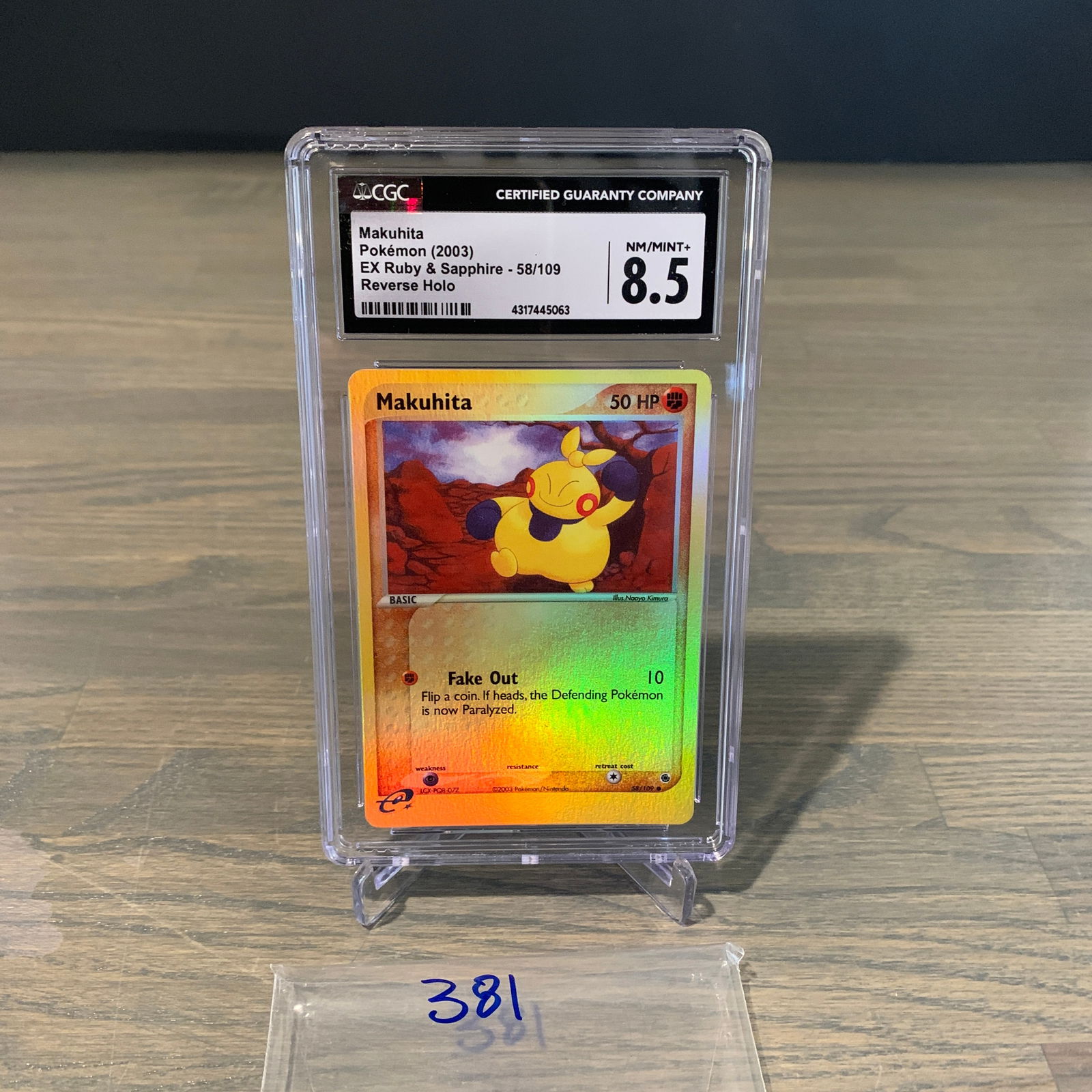 CGC 8.5 Makuhita Reverse Holo Pokemon Card (1 of 2)