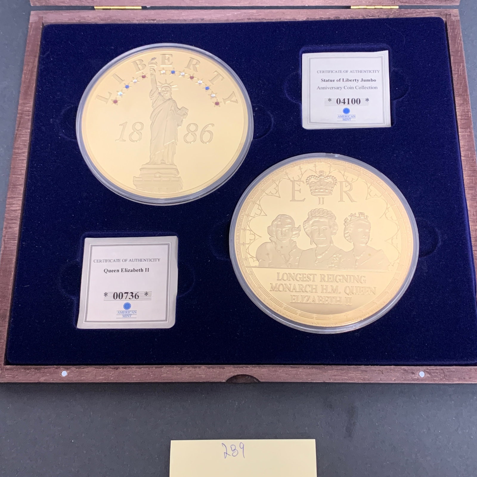 Queen Elizabeth and Statue of Liberty Gold coins: Queen Elizabeth Cu, Layered in 24k Gold jumbo coin proof, and Liberty 1886 Cu, Layered in 24k Gold with Swarovski crystals. proof. We are a veteran owned company. Please look at the pictures carefully