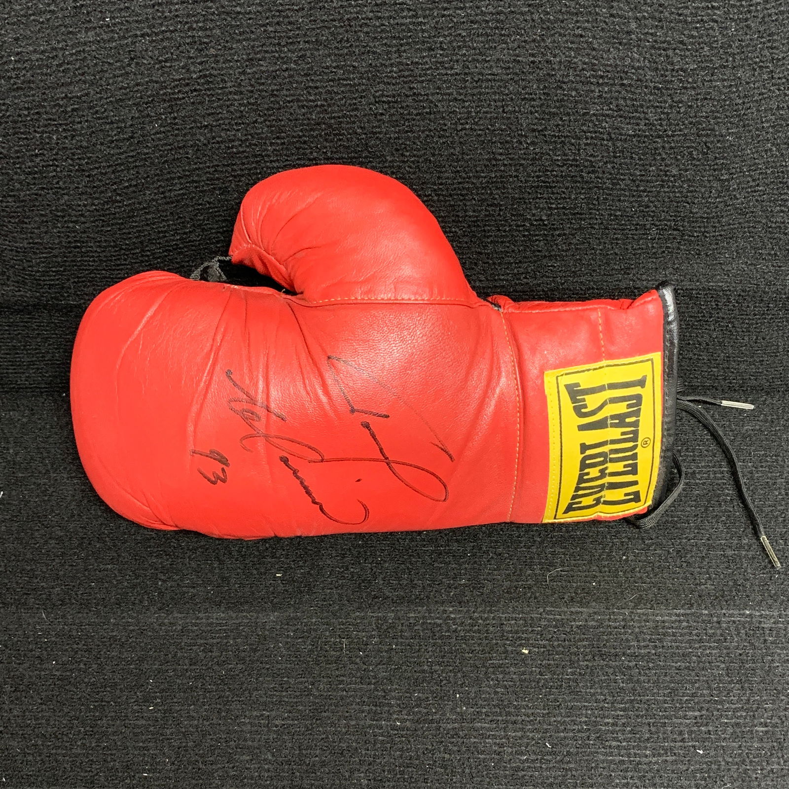 Tommy Morrison Signed Boxing Glove w/JSA: Signed Everlast Boxing Glove by Tommy Morrison. Includes COA from JSA. We are a veteran owned company. Please look at the pictures carefully to determine what you believe the condition of collecitible