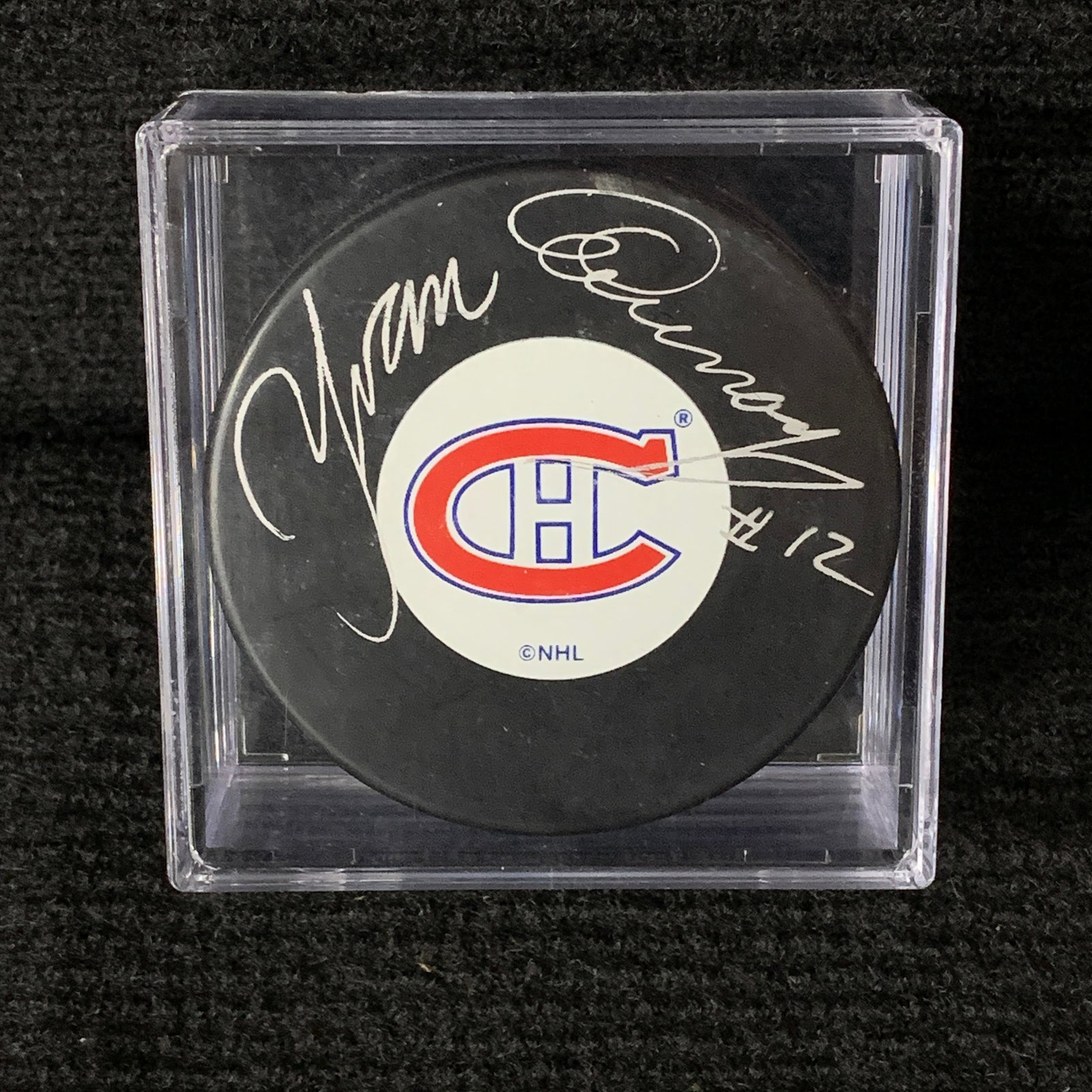 Yvan Cournoyer Signed Hockey Puck JSA COA: Montreal Canadiens Signed Hockey Puck. Signed by Yvan Cournoyer. COA from JSA. We are a veteran owned company. Please look at the pictures carefully to determine what you believe the condition of coll