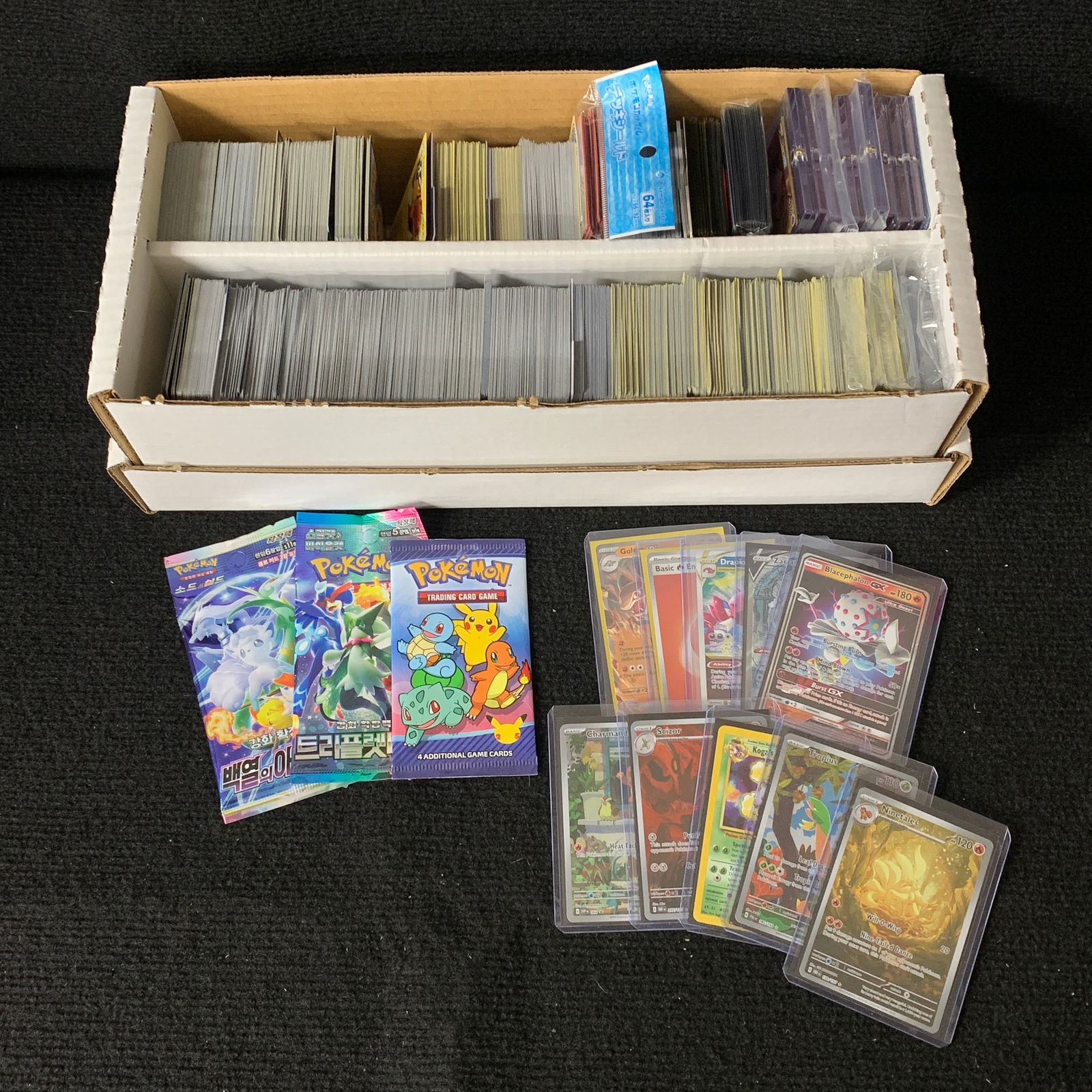 Box filled with over 1000 Pokemon Cards (1 of 6)