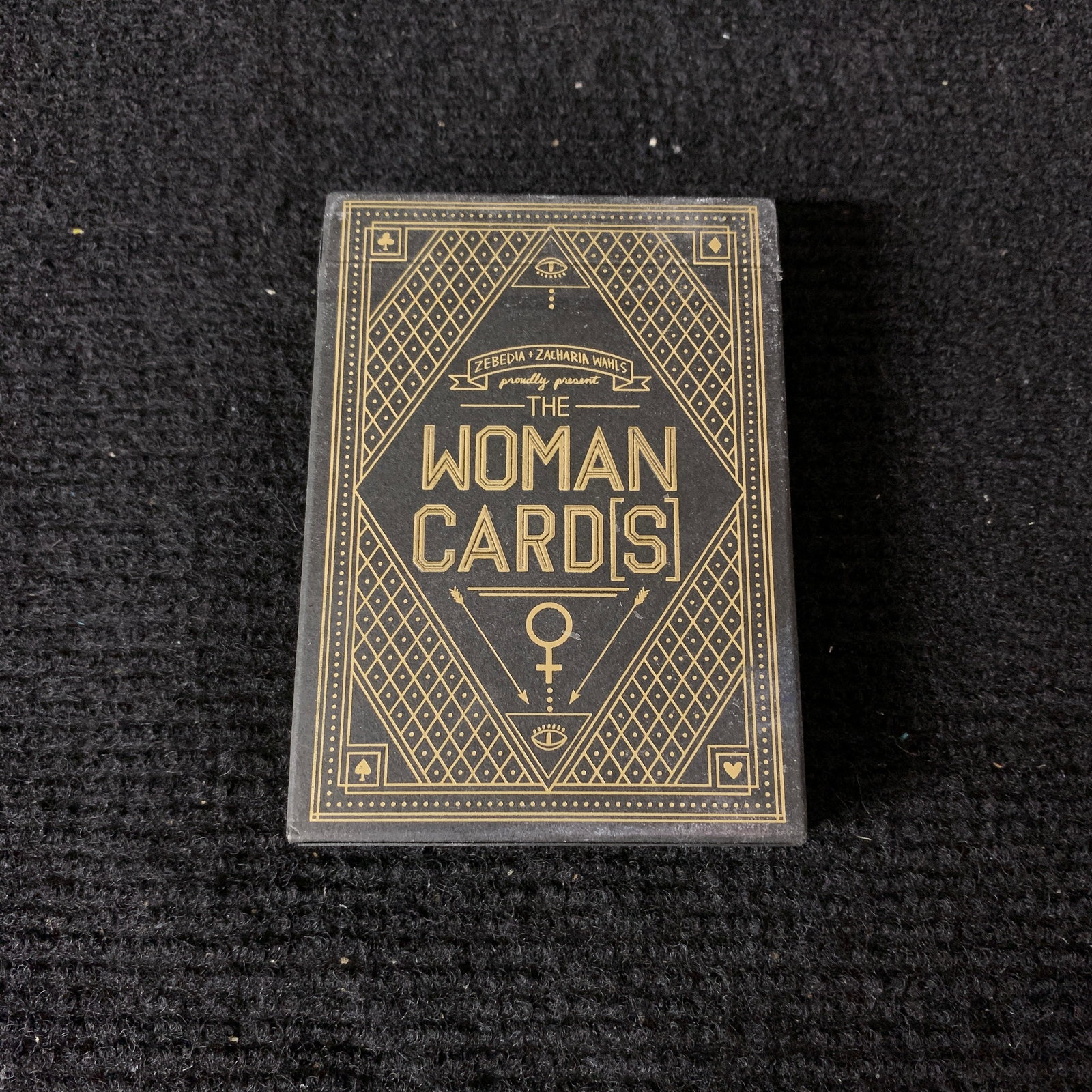 Sealed Zebedia Woman playing Cards, Gold Ed: Sealed Zebedia + Zacharia Wahls "The Woman" Playing Cards. Gold pack variant. We are a veteran owned company. Please look at the pictures carefully to determine what you believe the condition of colle