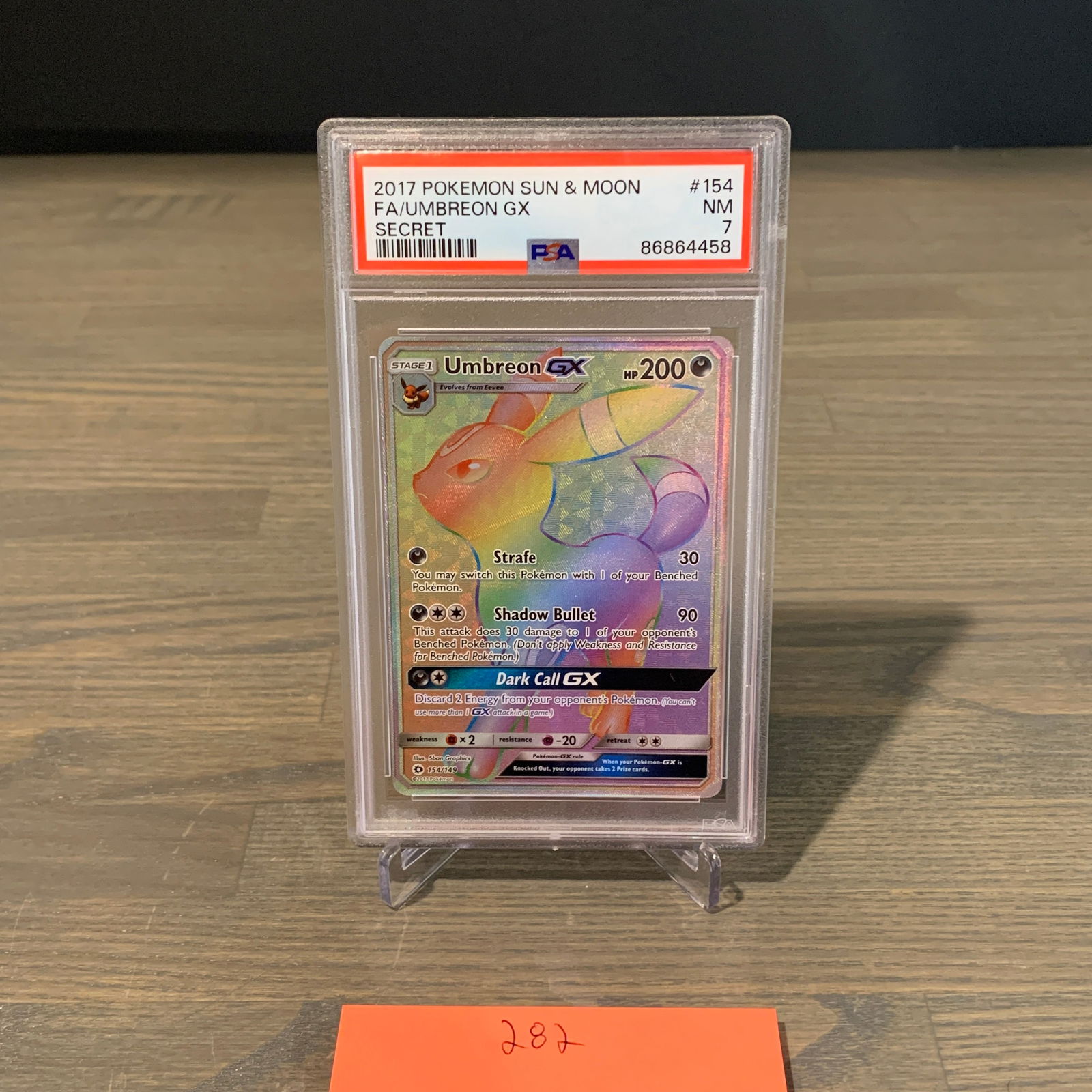 PSA 7 Rainbow Umbreon GX Pokemon Card (1 of 2)